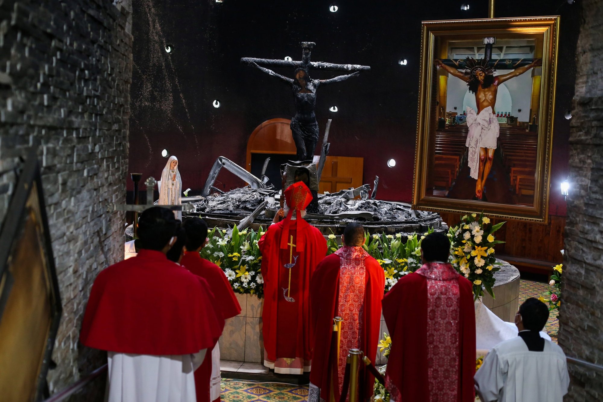 Nicaraguan Cardinal Leopoldo Brenes Solorzano of Managua prays as he celebrates Mass at the Metropolitan Cathedral July 31, 2021, to mark the first anniversary after the Blood of Christ Chapel was destroyed in an arson attack. (CNS/Maynor Valenzuela, Reuters)