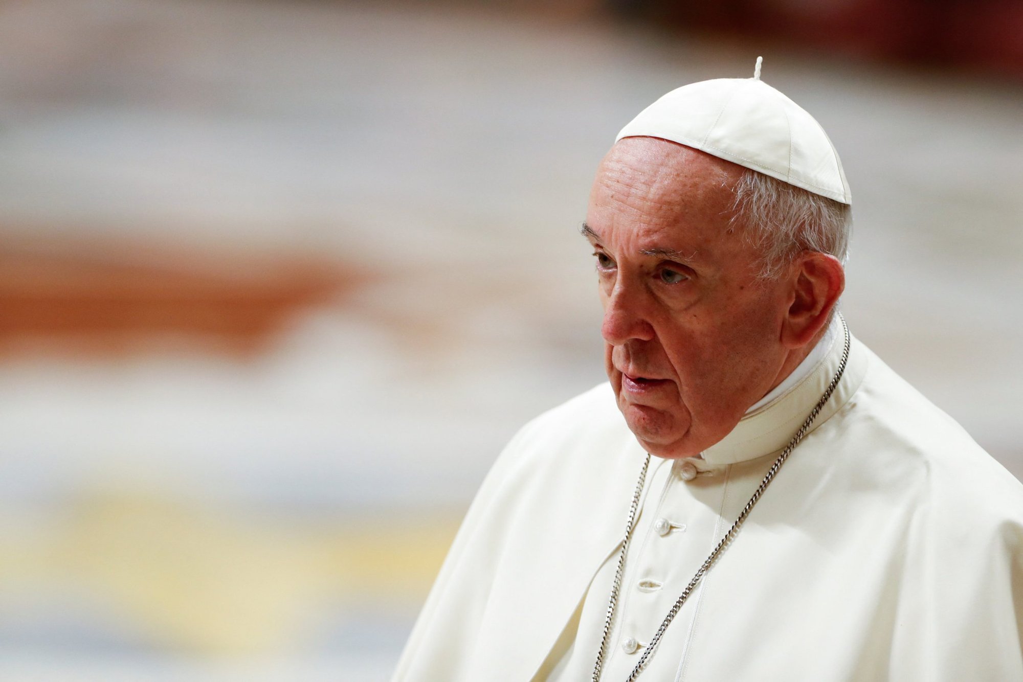 Pope Francis leaves at the conclusion of an evening prayer service in St. Peter's Basilica at the Vatican Dec. 31, 2021. (CNS/Remo Casilli, Reuters)
