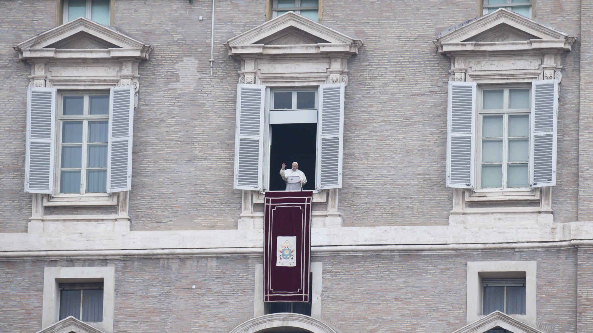 Pope Francis leads the Angelus from the window of his studio overlooking St. Peter's Square at the Vatican Jan. 3, 2021. The pope told pilgrims that God is always close to his children and, even "if we reject him, he does not tire of seeking us out." (CNS photo/Vatican Media)