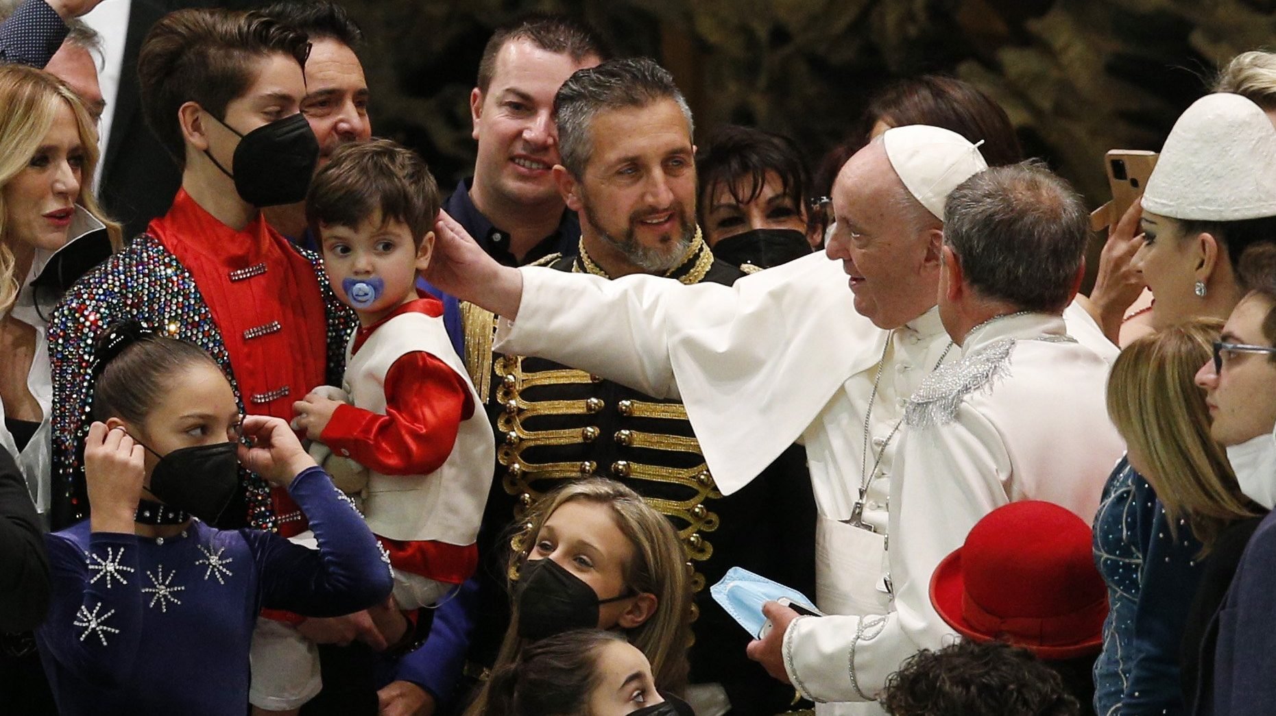Pope Francis greets members of Rome's Rony Roller Circus troupe during his general audience in the Paul VI hall at the Vatican Jan. 5, 2022. The circus performed for the pope. (CNS photo/Paul Haring)