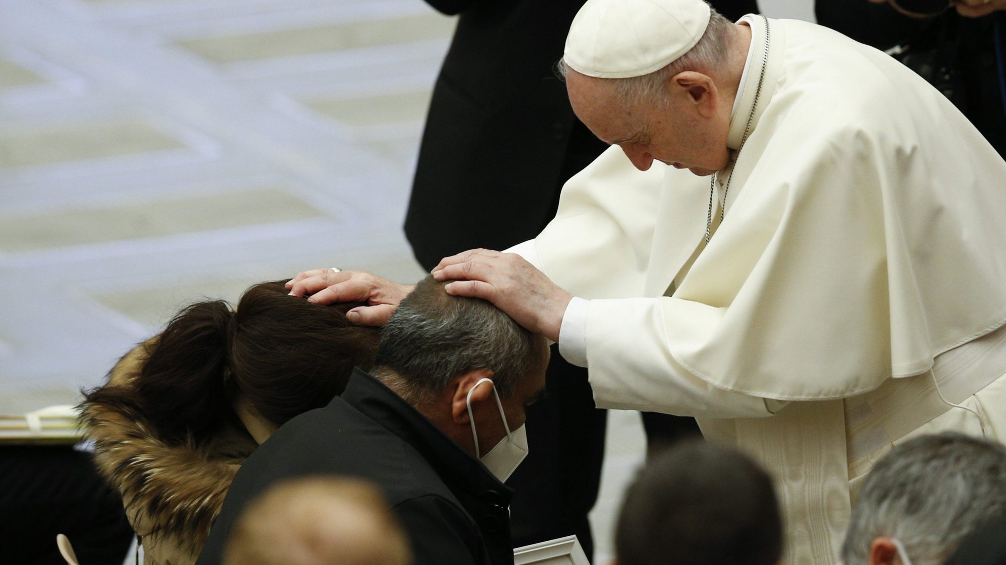 Pope Francis blesses people during his general audience in the Paul VI hall at the Vatican Jan. 19, 2022. (CNS photo/Paul Haring)