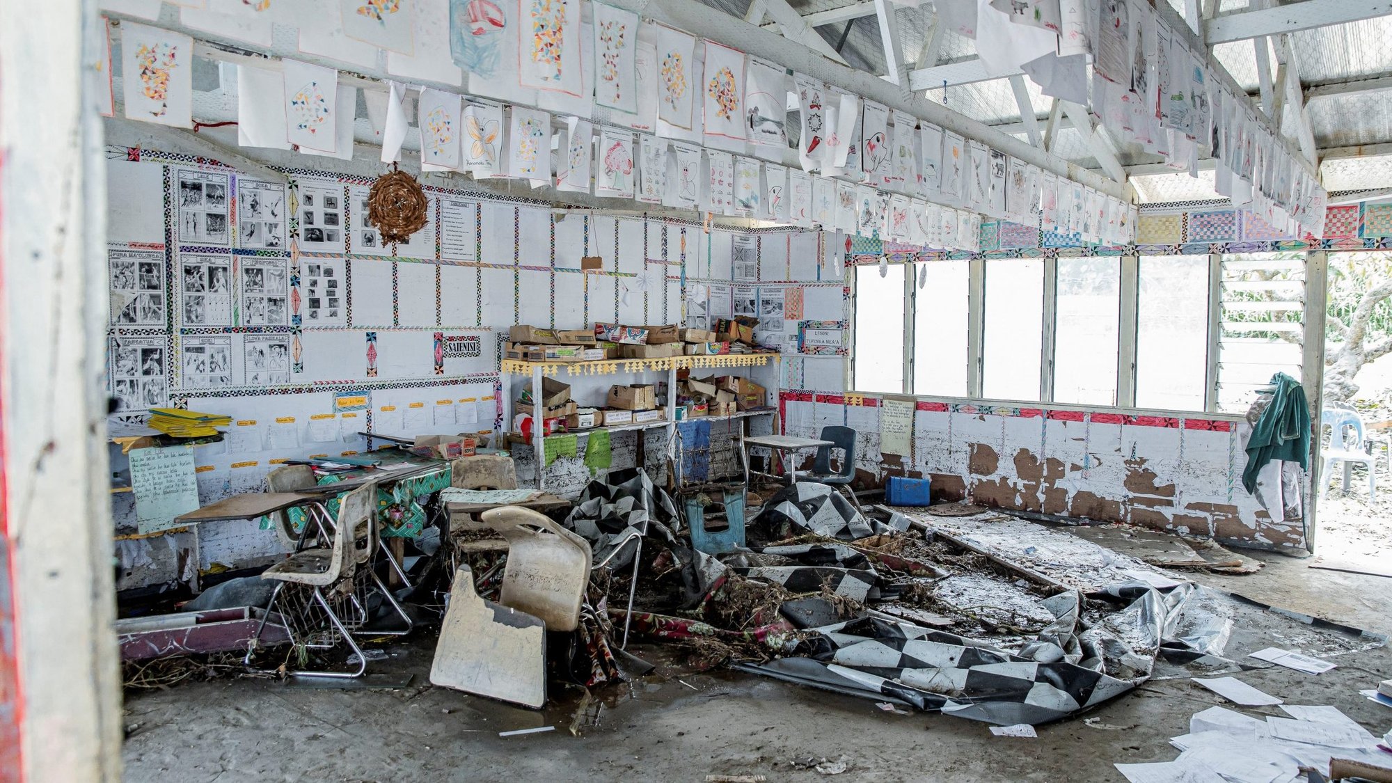 An image obtained from social media shows a damaged building in Tungua, Tonga, Jan. 18, 2022, three days after a volcanic eruption and tsunami damaged much of the the archipelago. The people of Tonga will need time, help and prayers to recover from one of the most devastating volcanic eruptions in modern times, said Cardinal Michael Czerny, an official in the Vatican Dicastery for Promoting Integral Human Development. (CNS photo/Malau Media via Reuters)