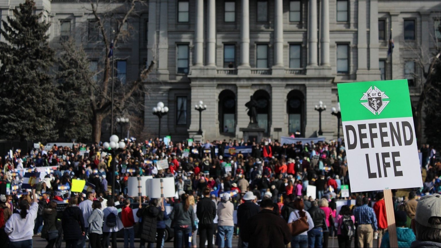 A participant holds a sign during the March for Life rally in front of the Colorado Capitol in Denver Jan. 17, 2015. The Colorado House of Representatives is considering passage of the Reproductive Health Equity Act, or H.B 22-1279, introduced March 3, 2022. Among other provisions, the measure would would codify Roe v. Wade in state law and make Colorado "the most radical abortion state in the country," according to the Colorado Catholic Conference. (CNS photo/Eileen Walsh)
