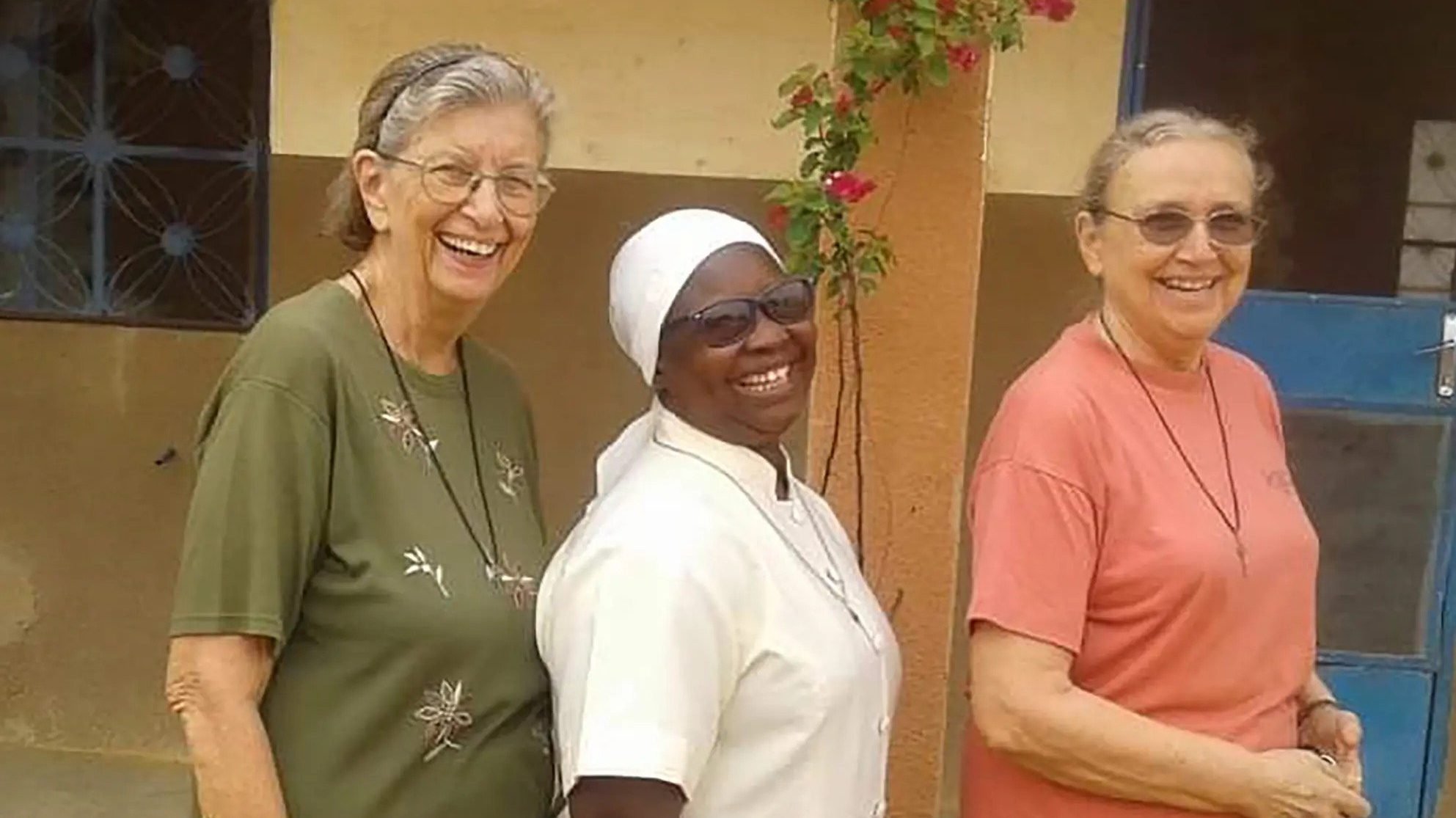 Three Marianite Sisters: Suellen Tennyson, Pascaline Tougma and Pauline Dourin, are pictured in an undated photo near the clinic where they serve in Yago, Burkina Faso. Sister Tennyson, 83, an American, was kidnapped late April 4 or early April 5 after armed attackers broke into the convent on the parish compound. (CNS photo/courtesy Marianites of the Holy Cross)