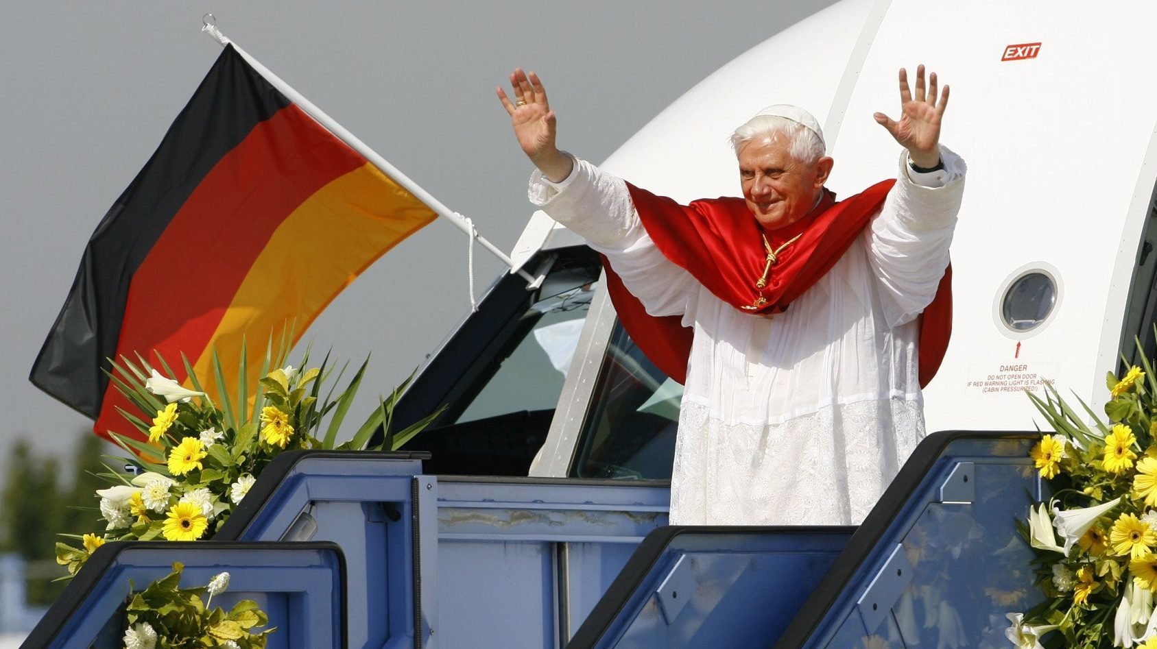 Pope Benedict XVI waves farewell at Franz Josef Strauss International Airport in Munich, Germany, in this Sept. 14, 2006, file photo at the end of a six-day trip to his homeland. The retired pope will celebrate his 95th birthday April 16, Holy Saturday. (CNS photo/Wolfgang Rattay, Reuters)