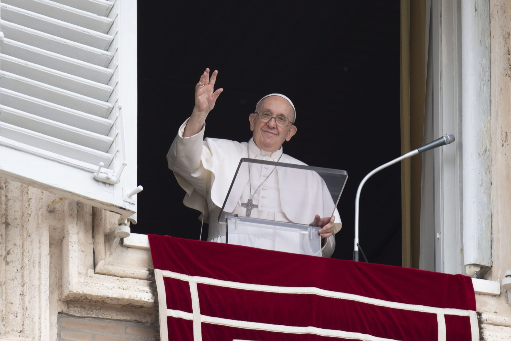 Pope Francis greets the crowd as he leads the "Regina Coeli" prayer from the window of his studio overlooking St. Peter's Square at the Vatican May 8, 2022. (CNS photo/Vatican Media)