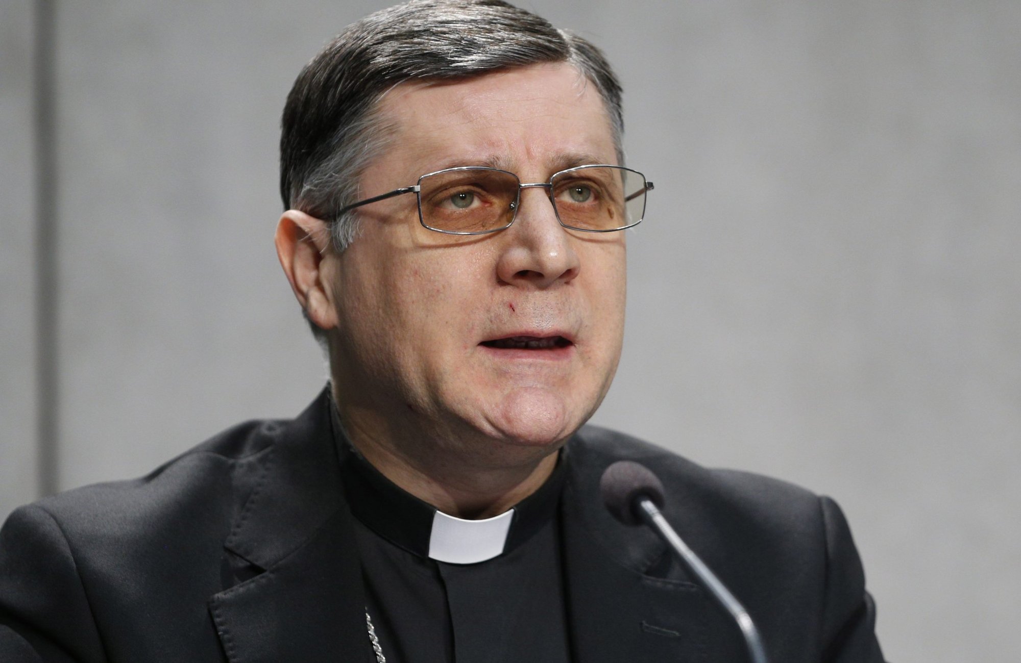 Bishop Marco Mellino, secretary of Pope Francis' Council of Cardinals, speaks at a news conference to present Pope Francis' document, "Praedicate Evangelium" ("Preach the Gospel"), for the reform of the Roman Curia, during a news conference at the Vatican in this March 21, 2022, file photo. Bishop Mellino said the pope's reform of the Roman Curia underlines the importance of bishops' conferences, particularly in fostering communion among the bishops themselves and with the pope. (CNS photo/Paul Haring)