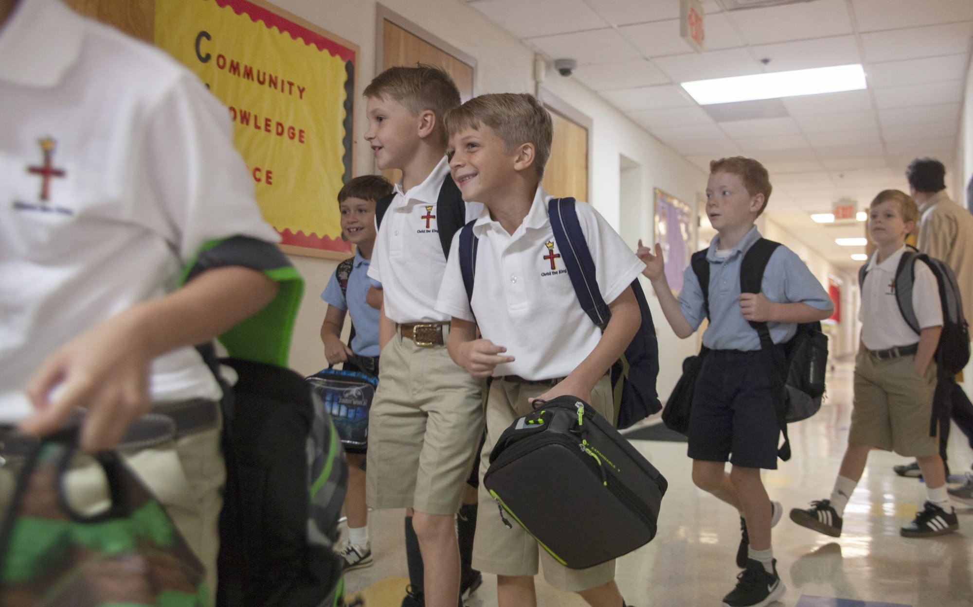 Third graders walk through a hallway at Christ the King School in Nashville, Tenn. (CNS photo/Rick Musacchio, Tennessee Register)