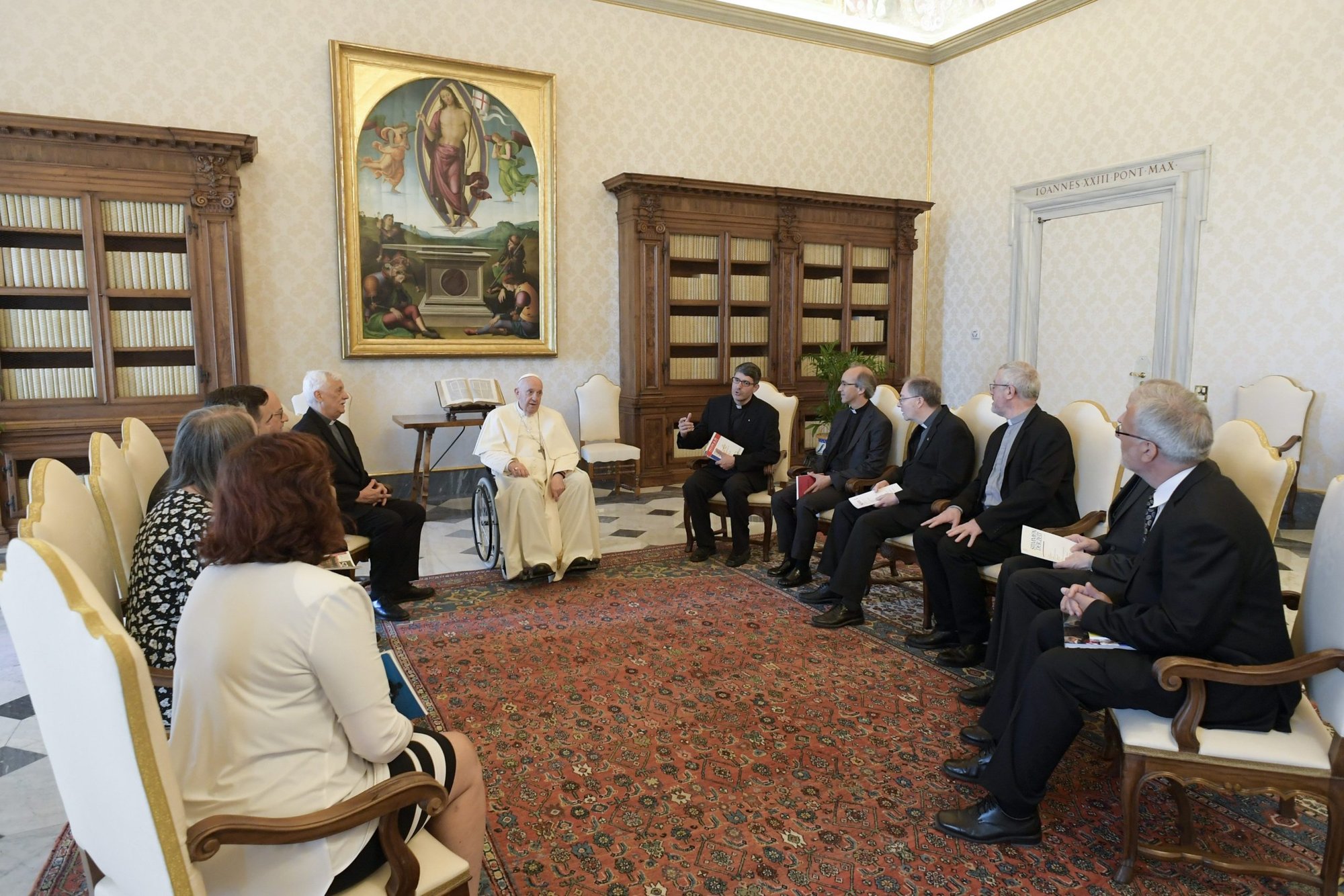 Pope Francis meets with the editors of 10 European Jesuit magazines and Father Arturo Sosa, superior general of the Jesuits, May 19, 2022, in the library of the Apostolic Palace at the Vatican. The pope responded to the editors' questions about the war in Ukraine, the current state of the Catholic Church and how he makes decisions when a diocese is experiencing turmoil. (CNS photo/Vatican Media)