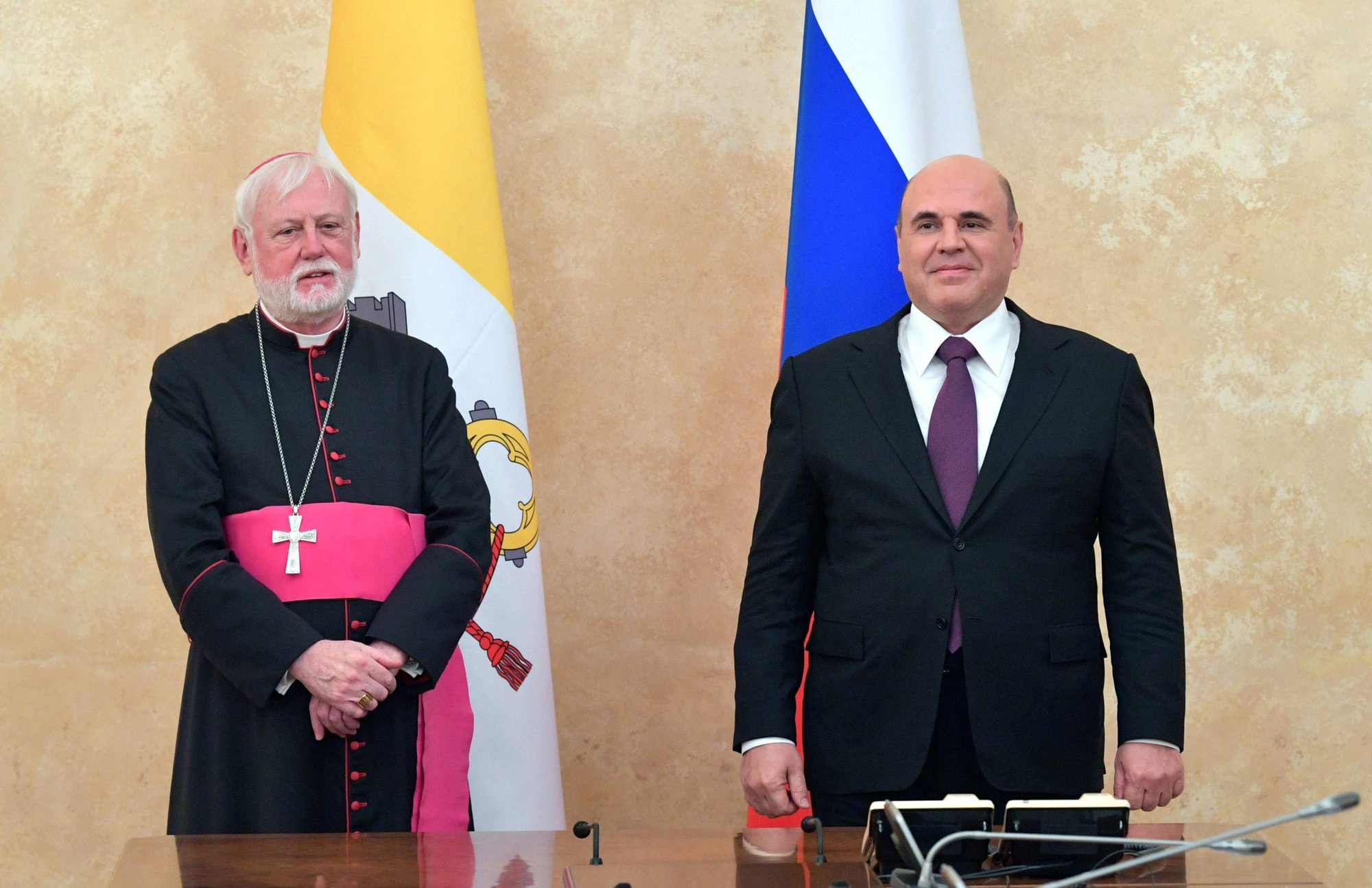 Archbishop Paul R. Gallagher, Vatican foreign minister, and Mikhail Mishustin, Russian prime minister, attend a meeting in Moscow in this Nov. 9, 2021, file photo. Archbishop Gallagher read a message from Pope Francis in Vienna June 21 at the first Meeting of States Parties to the Treaty on the Prohibition of Nuclear Weapons. The pope wrote that nuclear weapons are a "risk multiplier," not a deterrent to war. (CNS photo/Sputnik/Alexander Astafyev/Pool via Reuters)