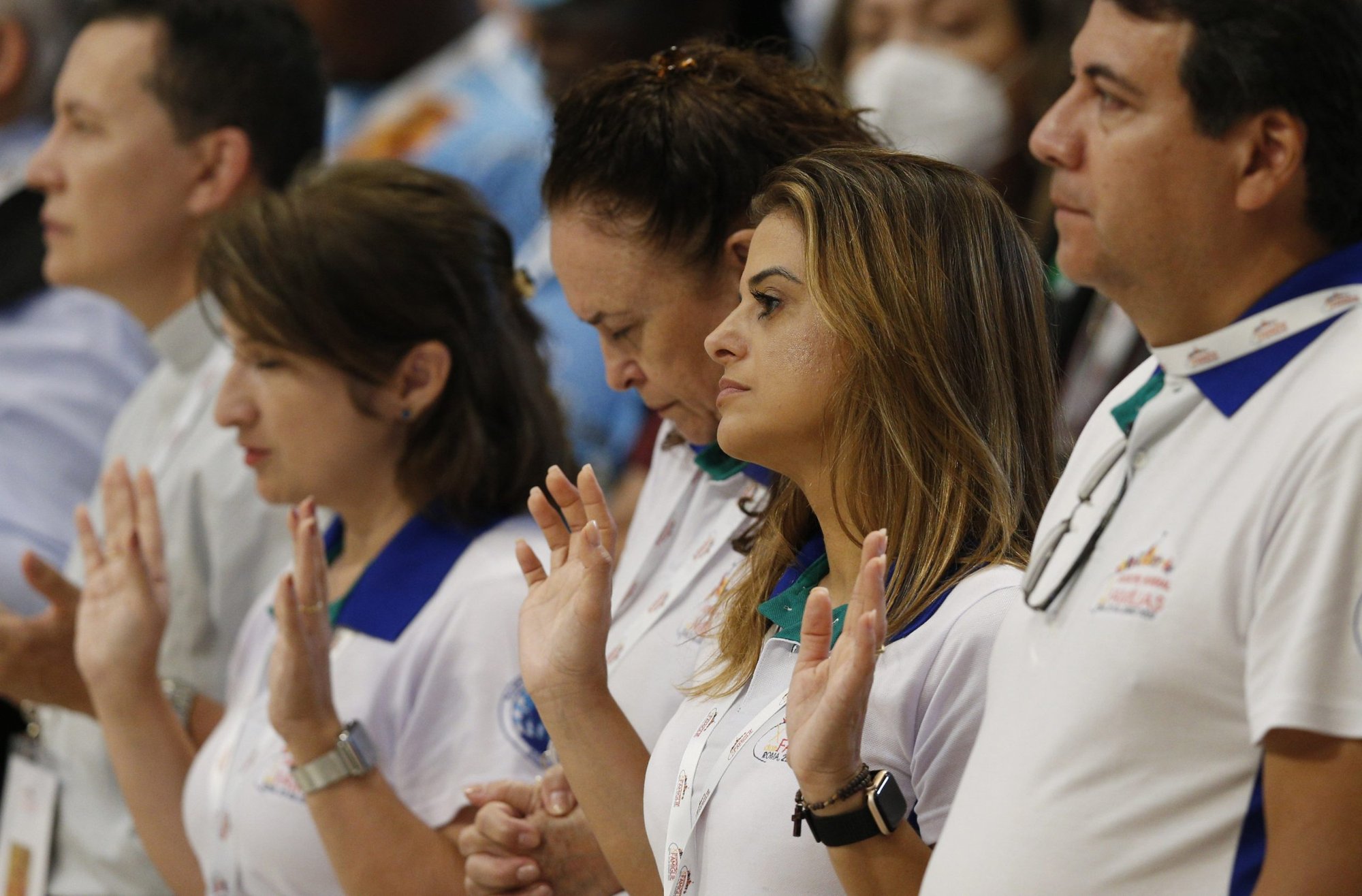 People pray the Lord's Prayer during Mass celebrated by Cardinal Kevin J. Farrell, prefect of the Dicastery for Laity, the Family and Life, in St. Peter's Basilica during the World Meeting of Families at the Vatican June 23, 2022. (CNS photo/Paul Haring)
