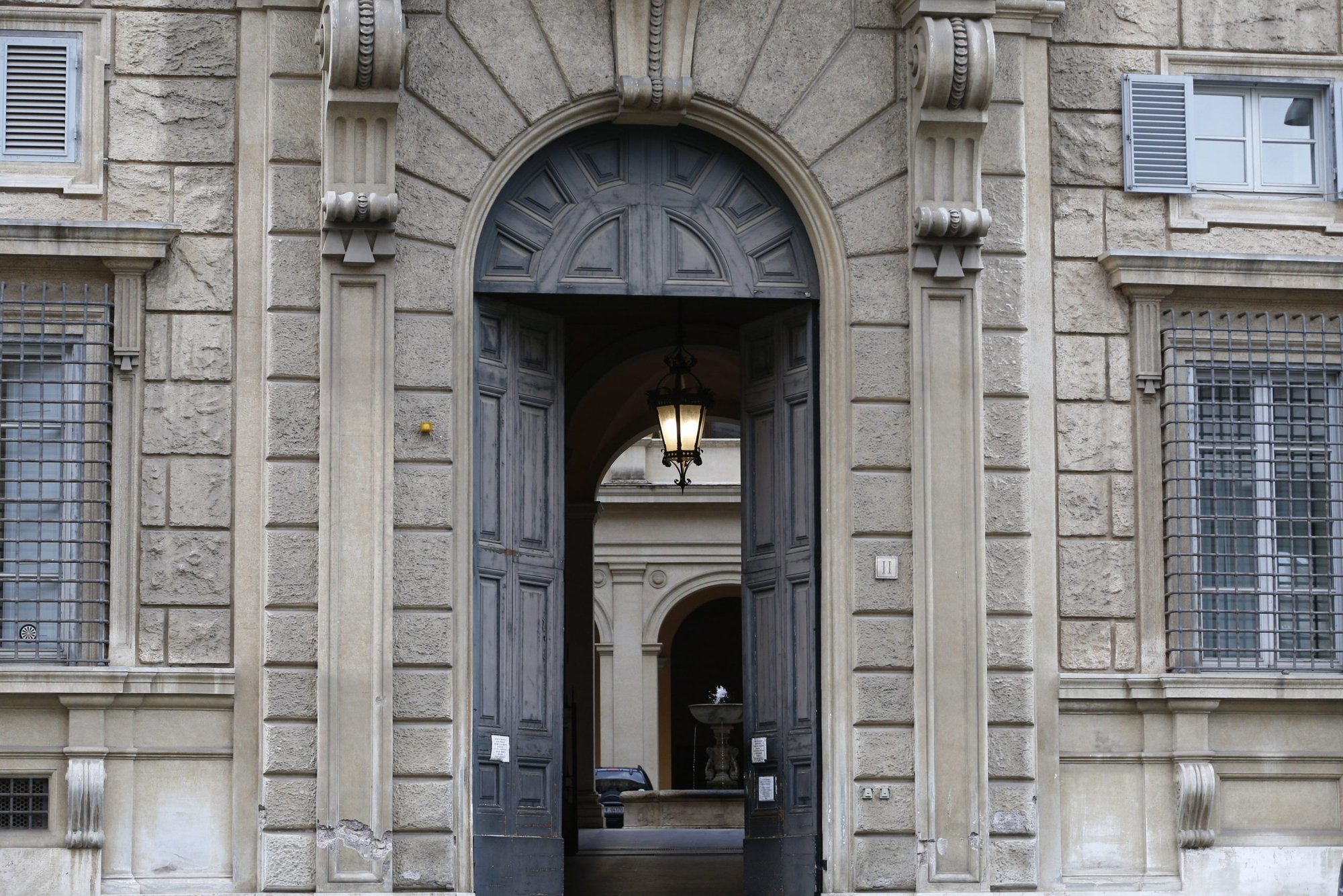 The main door at the headquarters of the Dicastery for the Doctrine of the Faith is seen at the Vatican Feb. 15, 2022. The dicastery has issued a slightly revised "vademecum" or step-by-step guidelines for handling allegations of the clerical abuse of minors and vulnerable persons. (CNS photo/Paul Haring)
