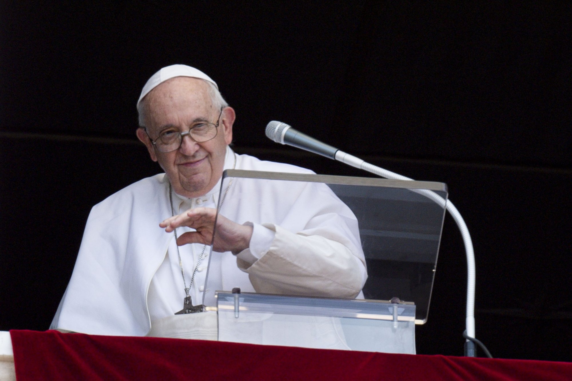 Pope Francis waves as he leads the Angelus from the window of his studio overlooking St. Peter's Square at the Vatican June 29, 2022. (CNS photo/Remo Casilli, Reuters)