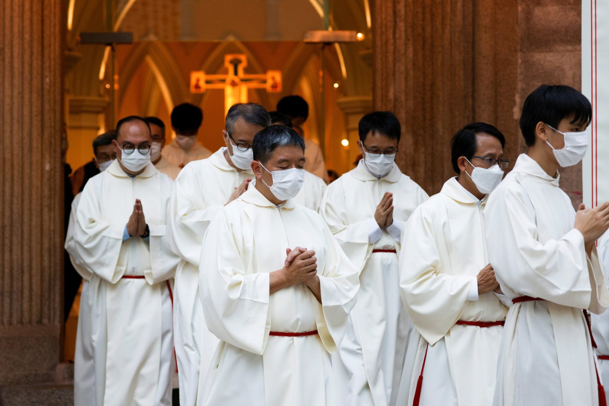 Clergymen depart following the installation Mass of Bishop Stephen Chow Sau-yan at Immaculate Conception Cathedral in Hong Kong Dec. 4, 2021. (CNS photo/Tyrone Siu, Reuters)