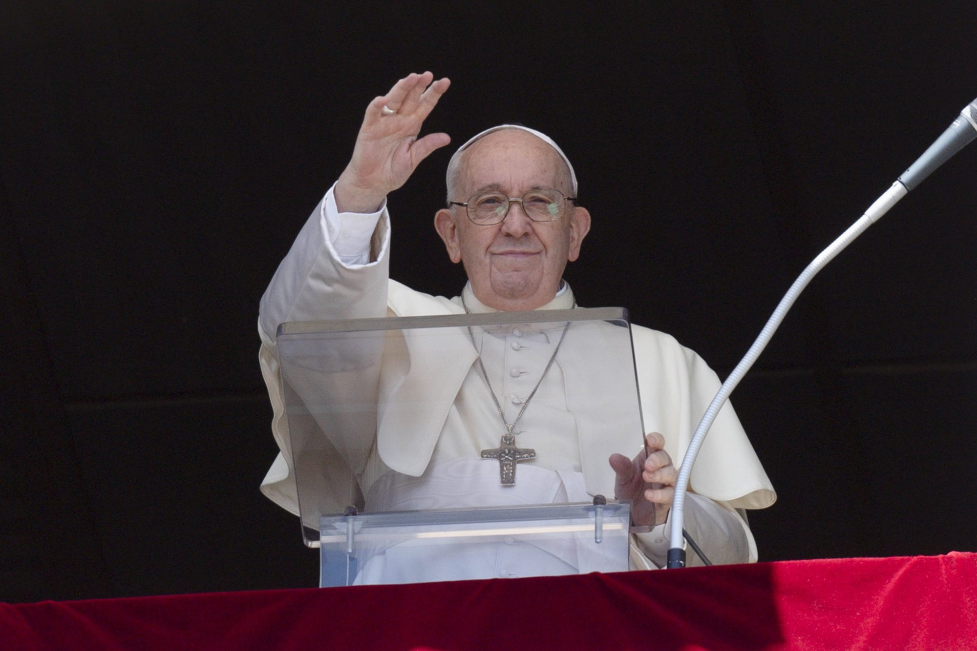 Pope Francis greets the crowd as he leads the Angelus from the window of his studio overlooking St. Peter's Square at the Vatican July 10, 2022. In his remarks the pope said the parable of the good Samaritan is a call for Christians to "have compassion on those whom we encounter along the way, above all on those who suffer and are in need." (CNS photo/Vatican Media)