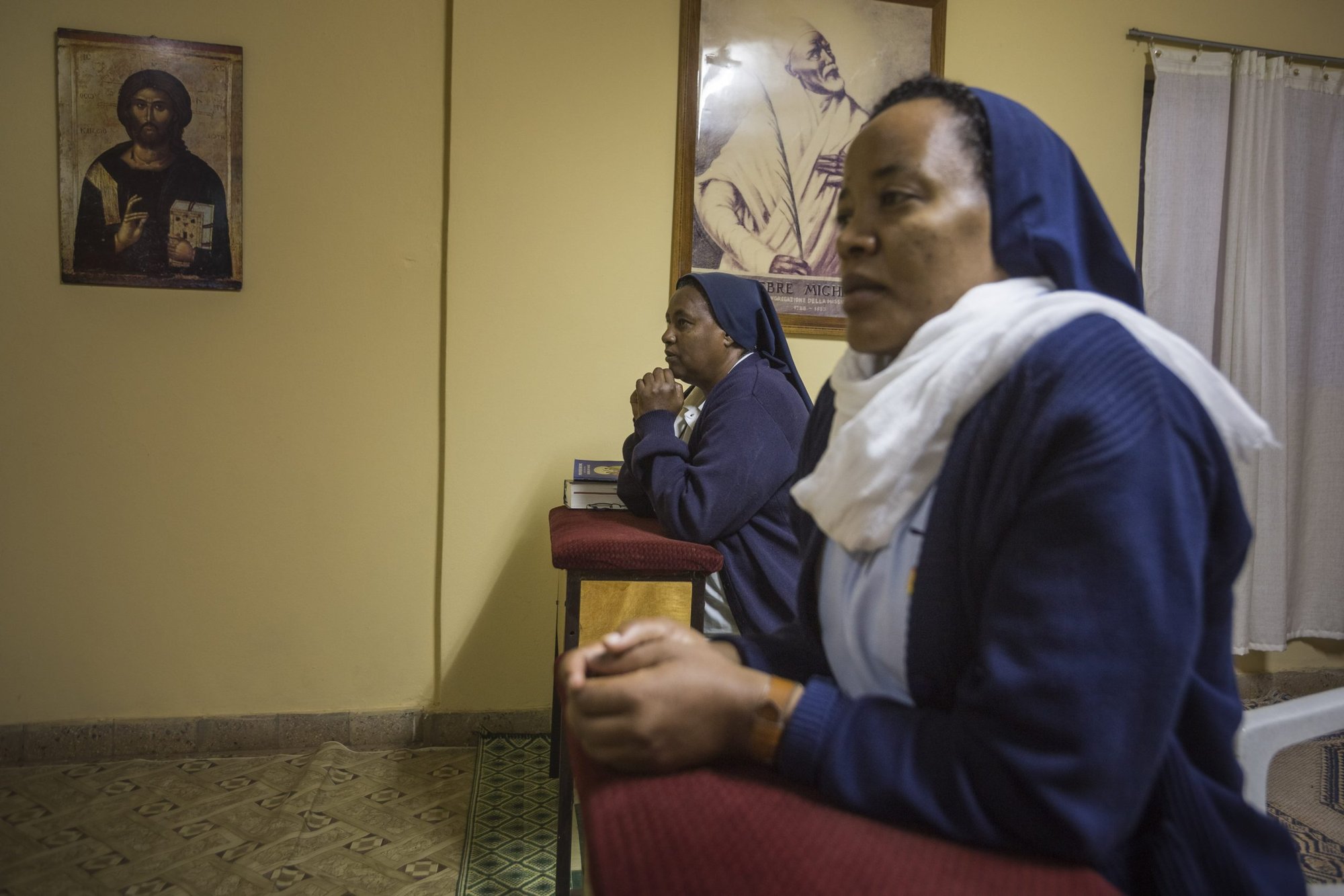 Two sisters of the Daughters of Charity in Bahir Dar, Ethiopia, gather for morning prayer in their convent chapel in this 2015 file photo. Catholic bishops in Ethiopia have warned that insecurity is shutting down churches and forcing more priests and nuns to flee their monasteries, as consequences of the war in the northern province of Tigray are felt across the country. (CNS photo/Petterik Wiggers, courtesy CNEWA)