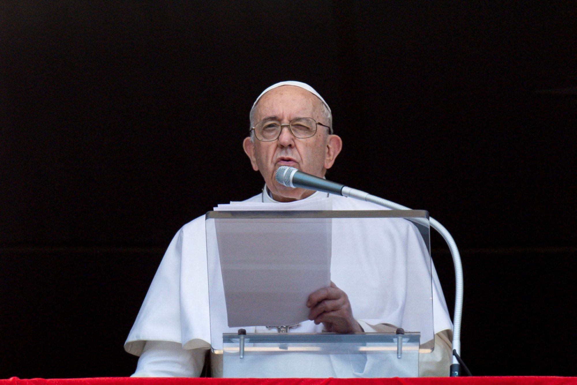 Pope Francis leads the Angelus from the window of his studio overlooking St. Peter's Square at the Vatican Aug. 7, 2022. (CNS photo/Vatican Media via Reuters)