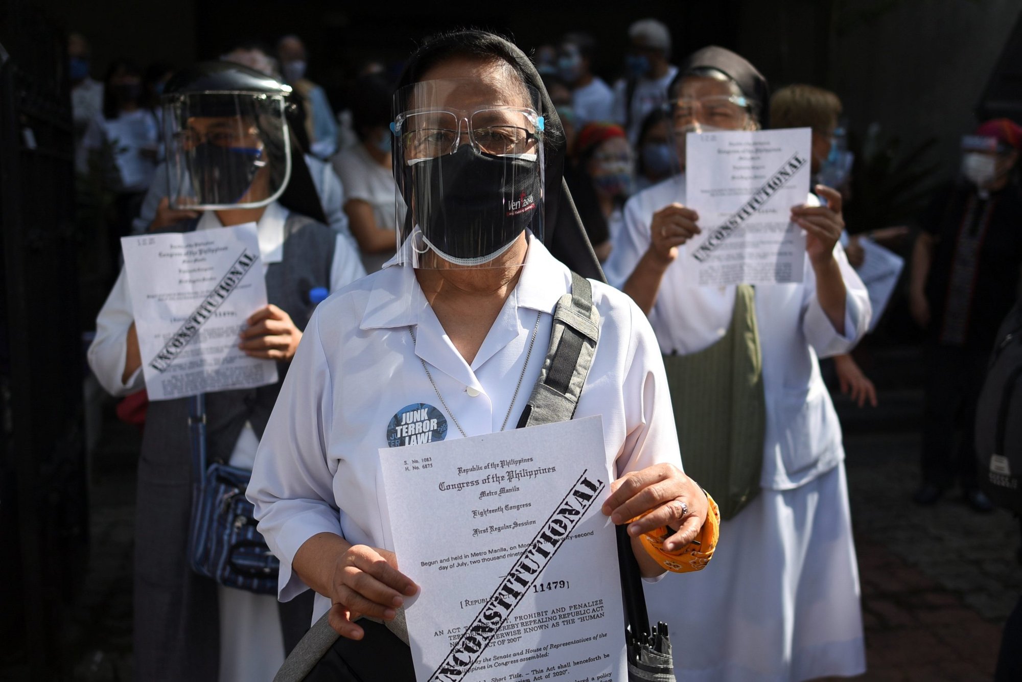 Members of religious groups take part in a protest a few hours before the start of the hearing of oral arguments on the anti-terrorism law, outside a church in Manila, Philippines, in this Feb. 2, 2021, file photo. Critics of the bill said it could be used to stifle political dissent and abuse human rights. (CNS photo/Lisa Marie David, Reuters)