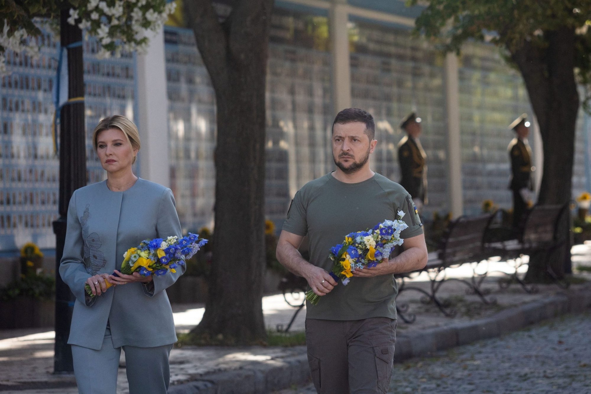 Ukraine's President Volodymyr Zelenskyy and his wife, Olena, lay flowers at the Memory Wall of Fallen Defenders of Ukraine in Kyiv Aug., 24, 2022, as Russia's attack on the Ukraine continues. (CNS photo/Ukrainian Presidential Press Service/Handout via Reuters)