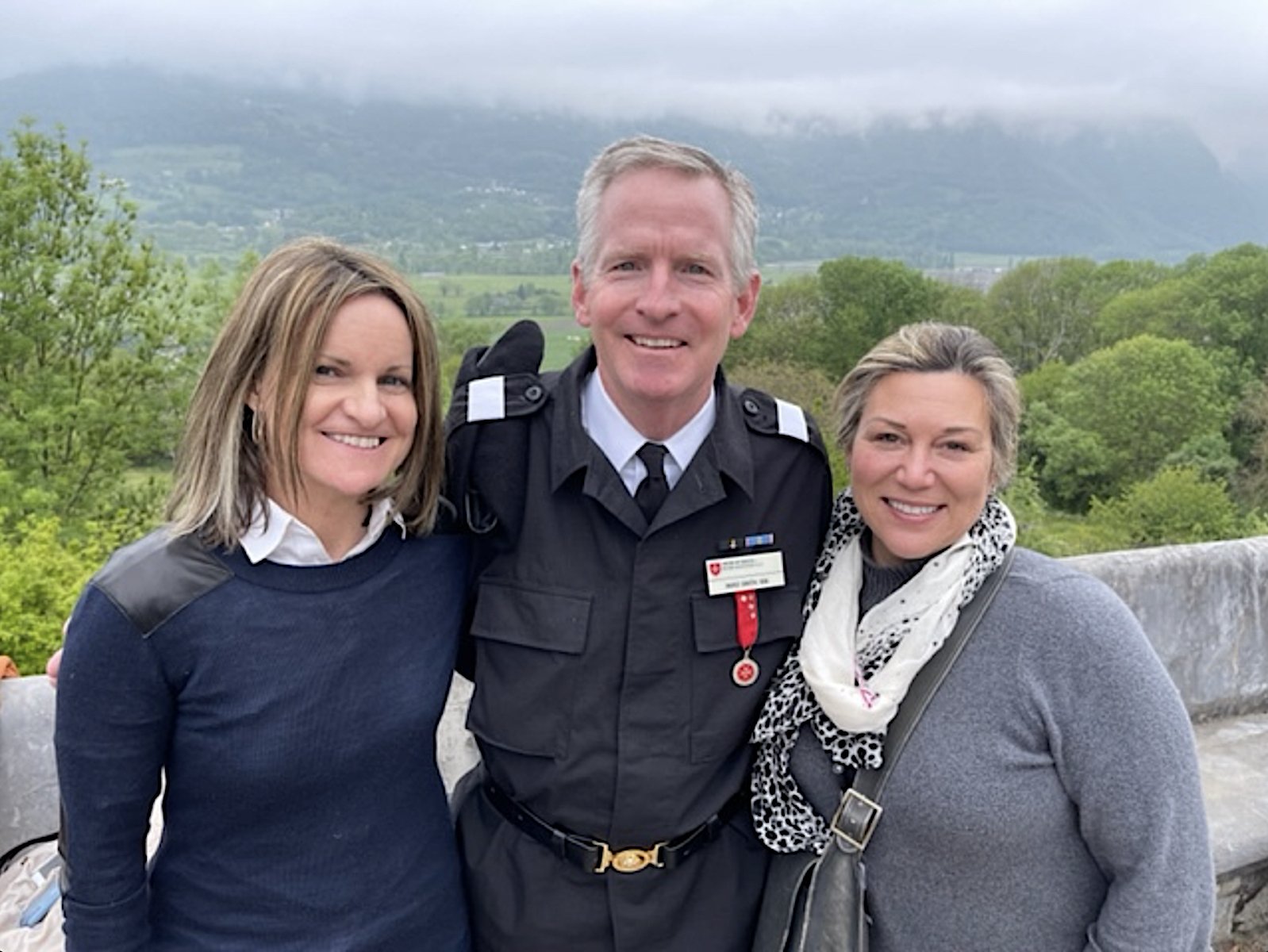 Jenny (left), with Knight Mike Smith, her cousin, and caregiver Dori O’Donnell. (Courtesy Jenny Patton Gorman)