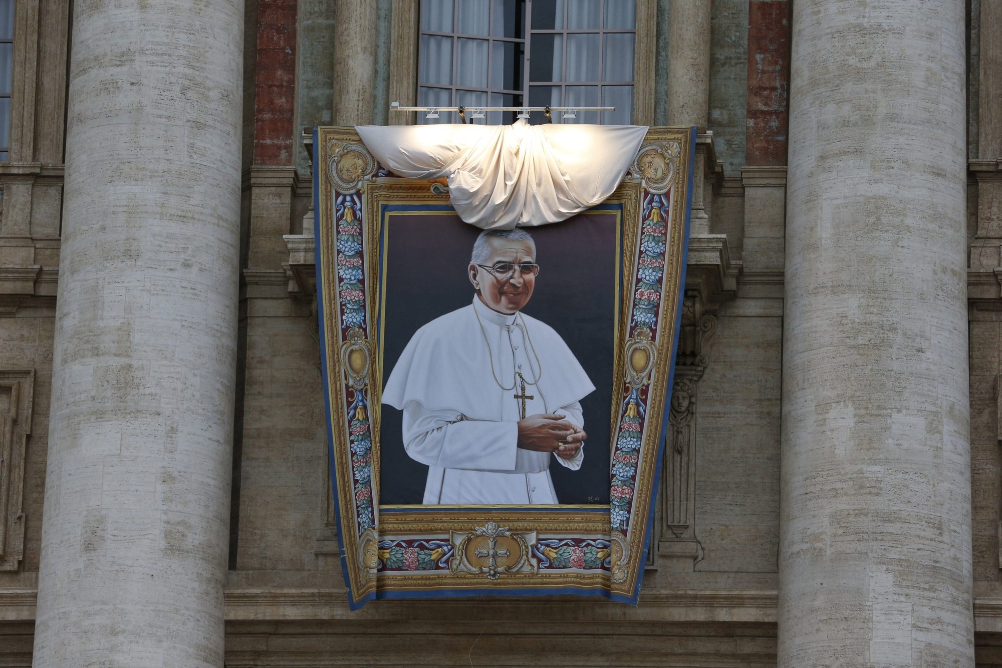 A banner showing Pope John Paul I is unveiled on the facade of St. Peter's Basilica as Pope Francis leads the beatification of the late pope in St. Peter's Square at the Vatican Sept. 4, 2022. (CNS photo/Paul Haring)