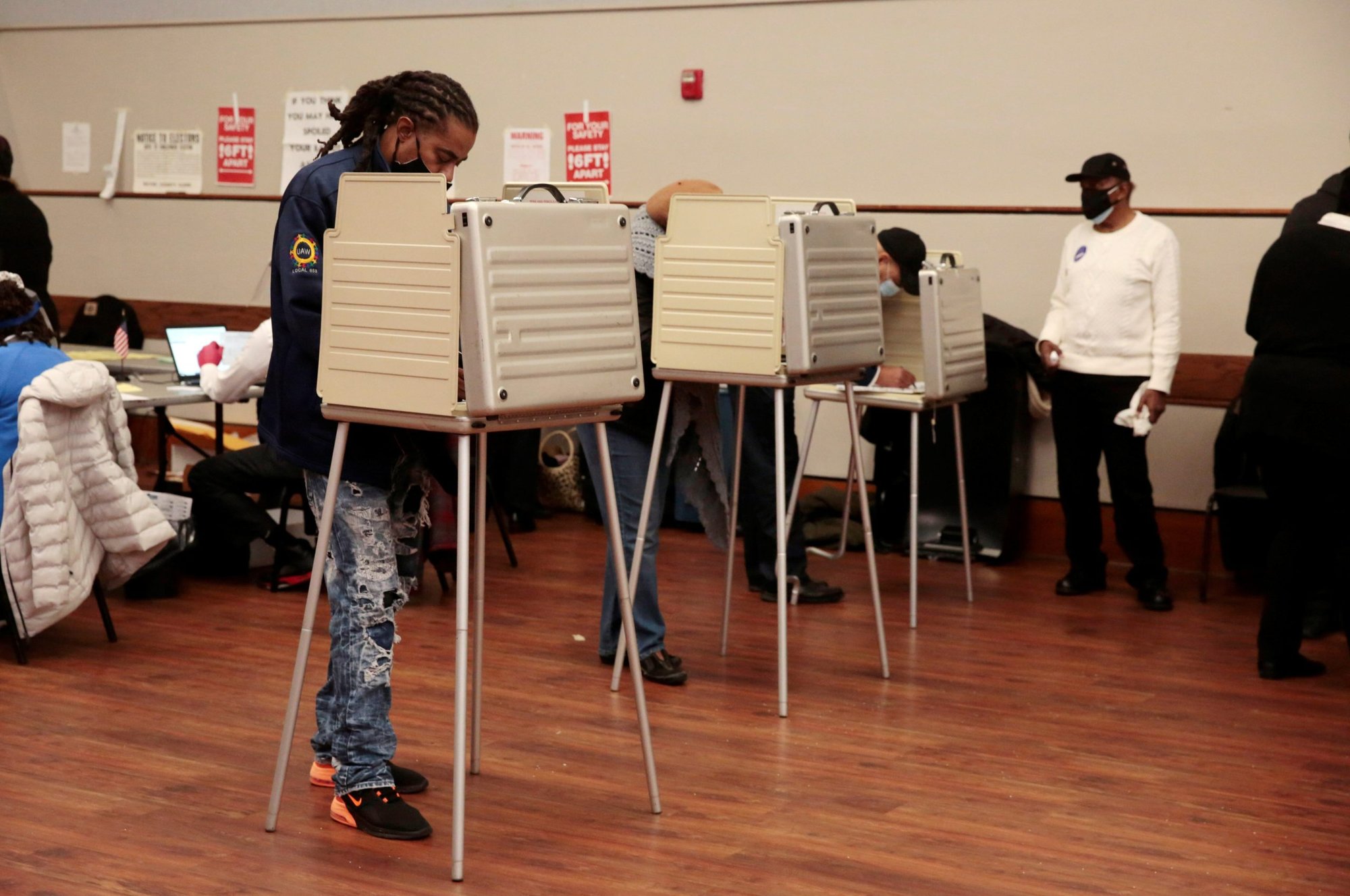 Voters at a polling station in Detroit, Mich., fill out their ballots Nov. 3, 2020. (CNS photo/Rebecca Cook, Reuters)