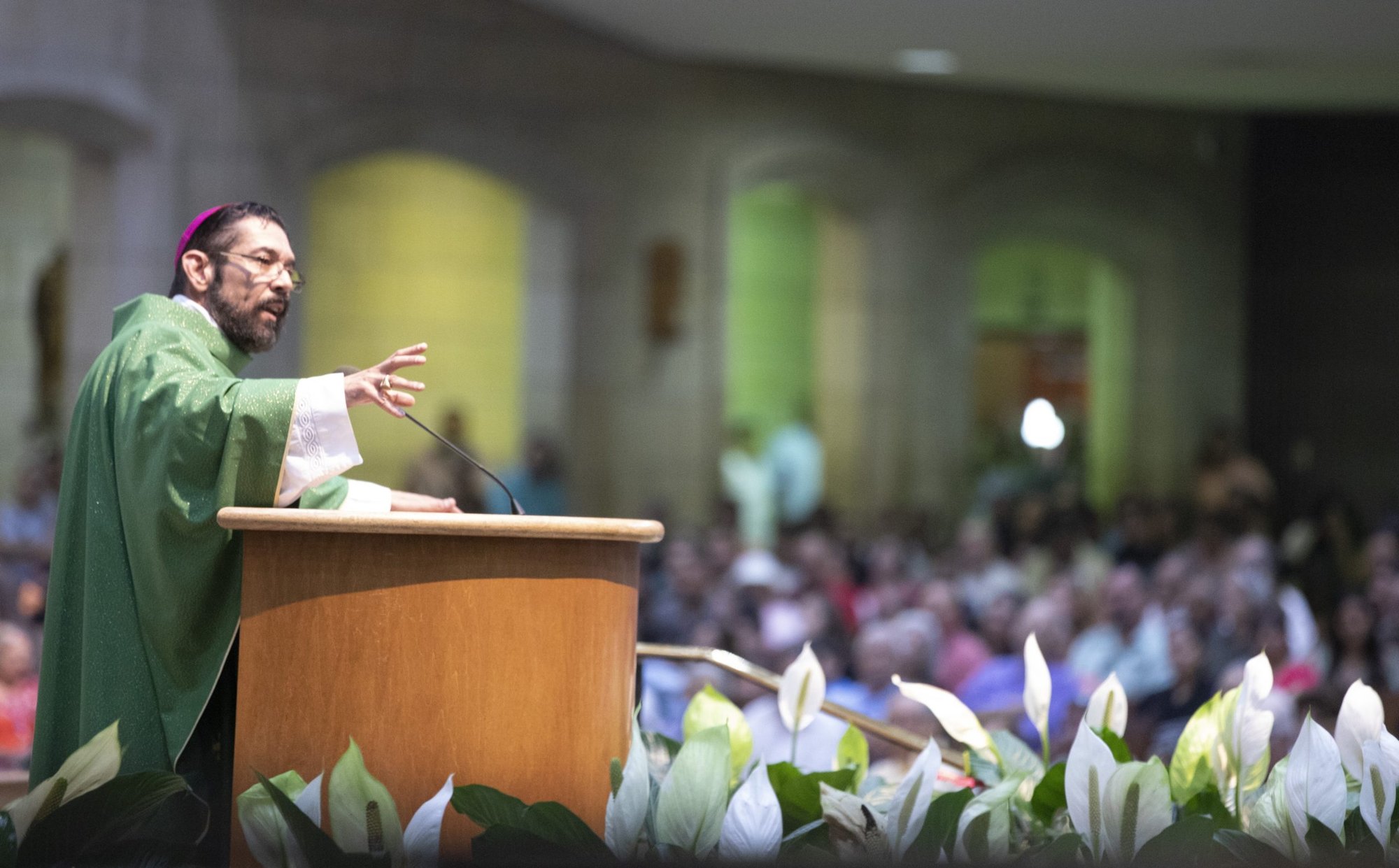 Bishop Daniel E. Flores of Brownsville, Texas, delivers his homily July 1, 2018, at the Basilica of Our Lady of San Juan del Valle in San Juan, Texas. Bishop Flores, chairman of the U.S. Conference of Catholic Bishops' Committee on Doctrine, is overseeing the synodal process for the USCCB. (CNS photo/Chaz Muth)