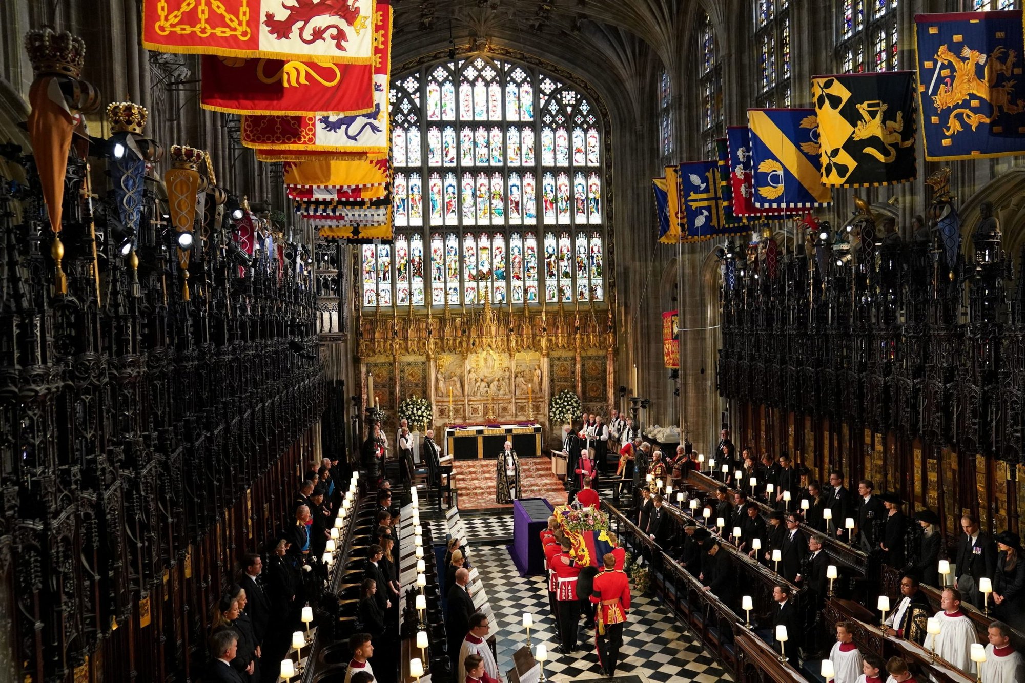 The casket of Queen Elizabeth II is carried by pallbearers into the committal service at St. George's Chapel in Windsor Castle Sept. 19, 2022. (CNS photo/Joe Giddens, pool via Reuters)