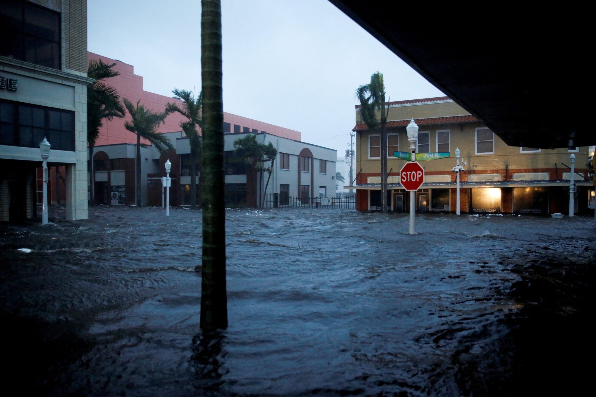 Floodwaters cover a road after Hurricane Ian made landfall in Fort Myers, Fla., Sept. 28, 2022. (CNS photo/Marco Bello, Reuters)