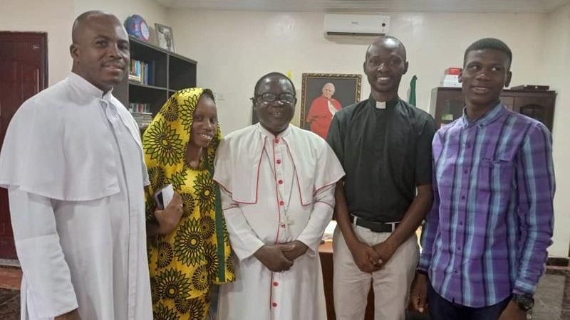 Formerly detained Father Oliver Opara (left) with Ummi Hassan; Bishop Matthew Kukah of the Diocese of Sokoto (not an abductee); Father Stephen Ojapah; and Hassan Fareed Hassan after the four were released from being held captive by terrorists. (Photo courtesy of the Diocese of Sokoto via CNA)