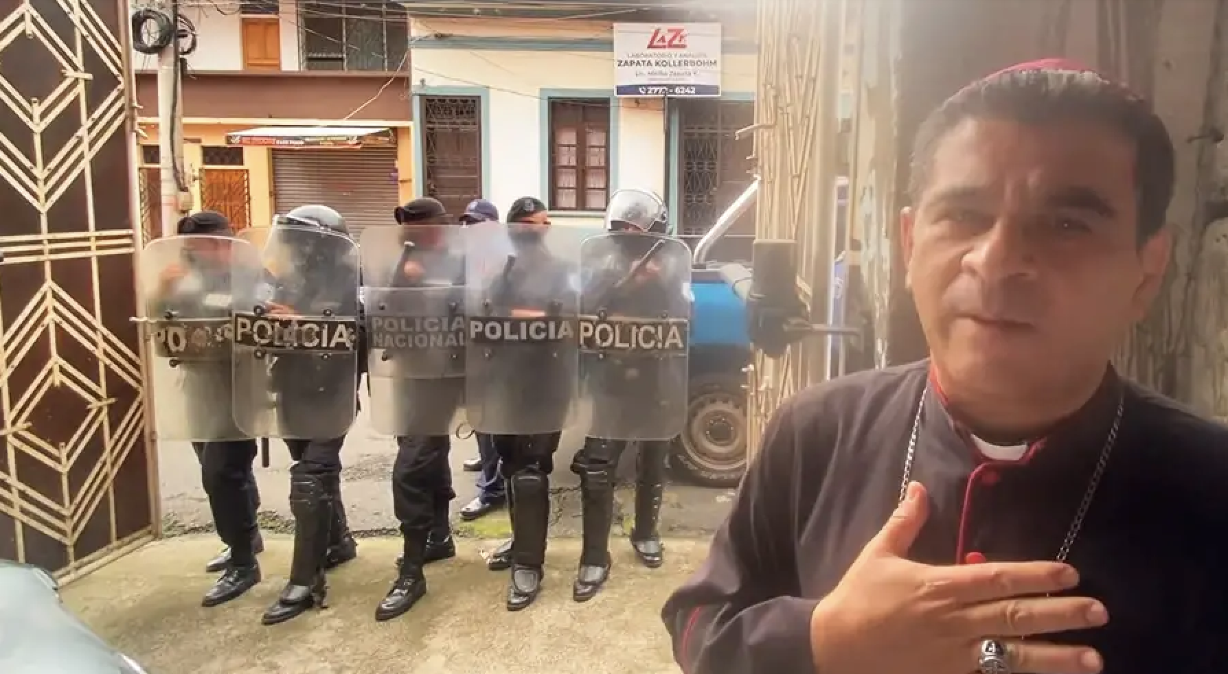 Bishop José Álvarez Lagos is surrounded by police officers on Aug. 4, 2022. The bishop's detention was cited in a Sept. 13, 2022, U.N. human-rights report. (Diocese Media TV Merced/Diocese of Matagalpa via CNA)