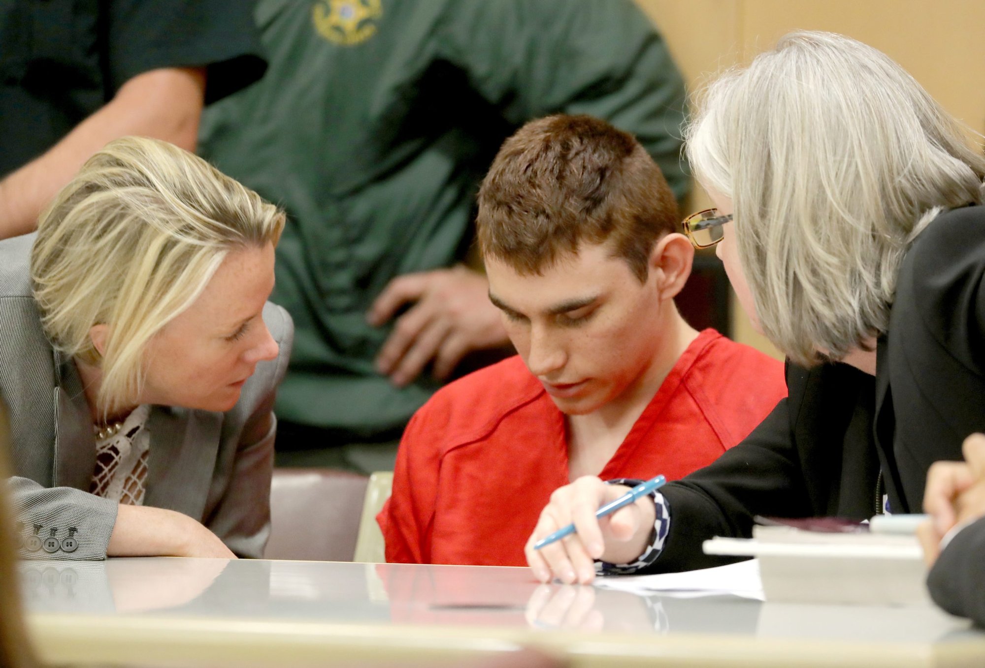 Nikolas Cruz, facing 17 charges of premeditated murder in the mass shooting at Marjory Stoneman Douglas High School in Parkland, Fla., appears in court for a status hearing in Fort Lauderdale in 2018. (CNS photo/Mike Stocker, pool via Reuters)
