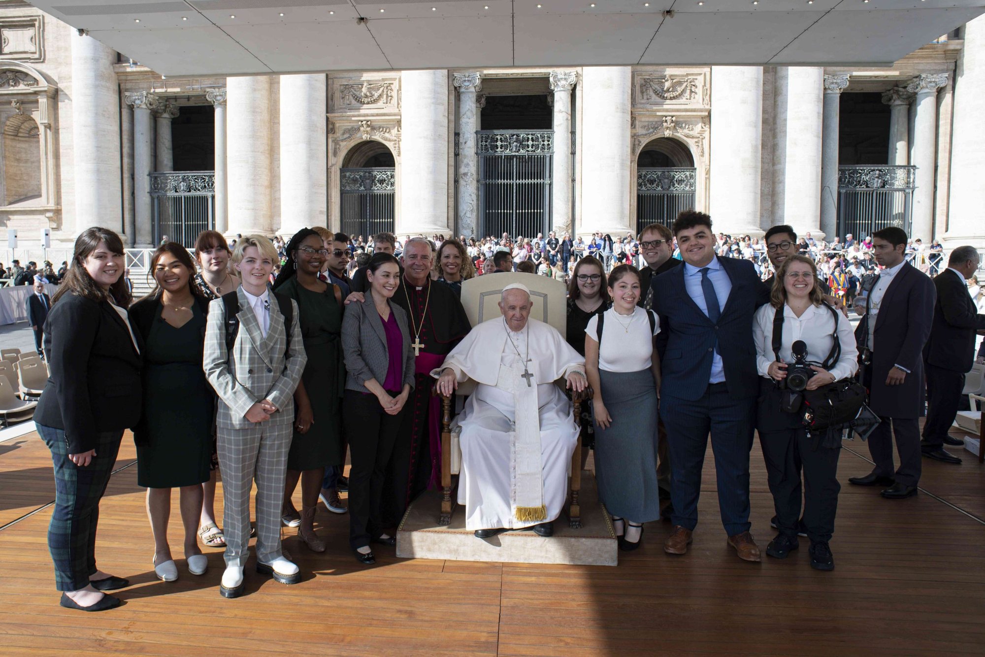 Young students who are members of the National Youth Advisory Council pose with Pope Francis and Archbishop Nelson J. Pérez of Philadelphia, at the pope's right, at the end of his general audience in St. Peter's Square at the Vatican Oct. 13, 2022. The council, launched over the summer, brings the voice of young people into the work and ministry of the National Federation for Catholic Youth Ministry. (CNS photo/Vatican Media)