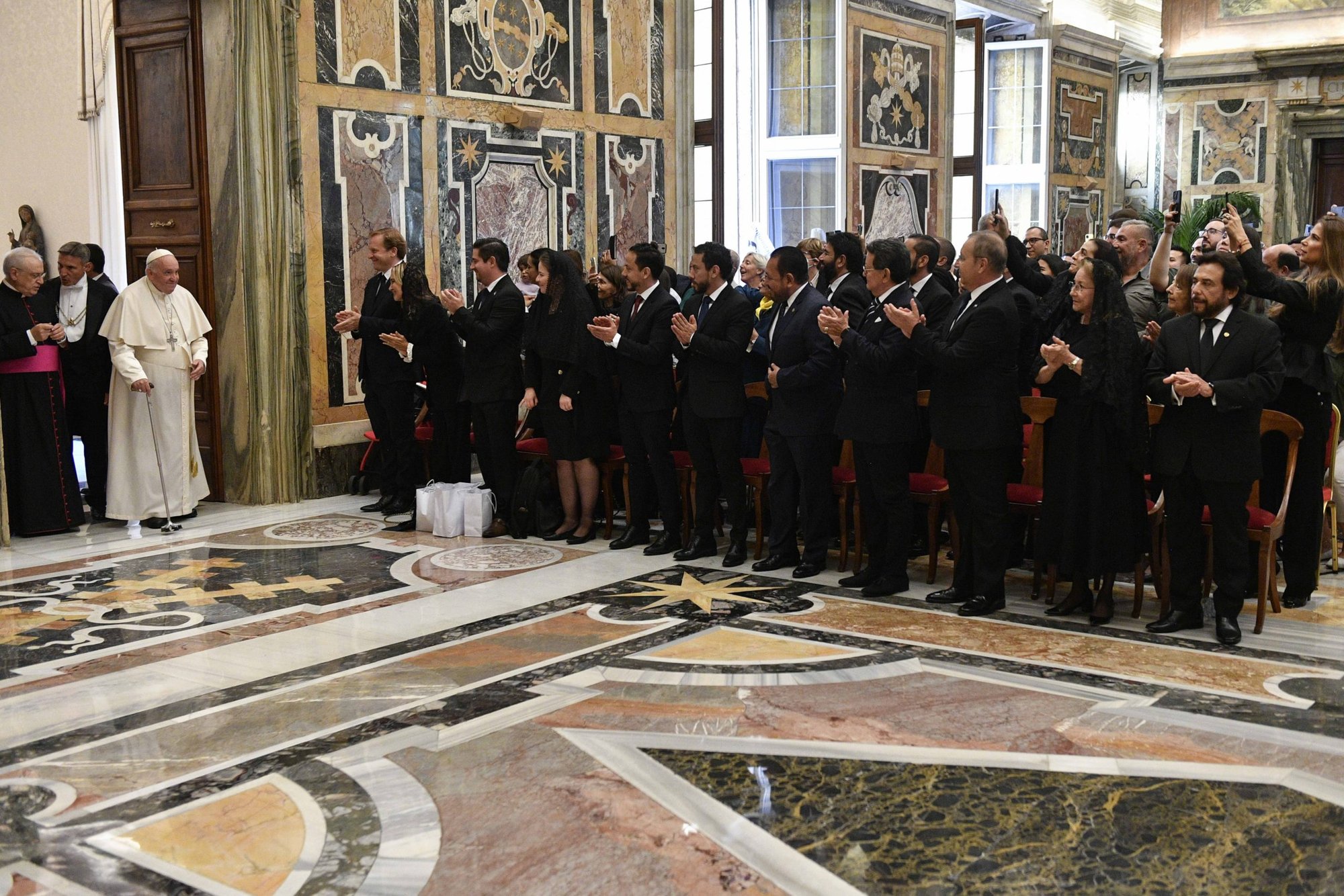 Pope Francis enters the Clementine Hall in the Apostolic Palace at the Vatican Oct. 14, 2022, during a meeting with faithful from El Salvador, who came to thank the pope for the beatification of Father Rutilio Grande. (CNS photo/Vatican Media)