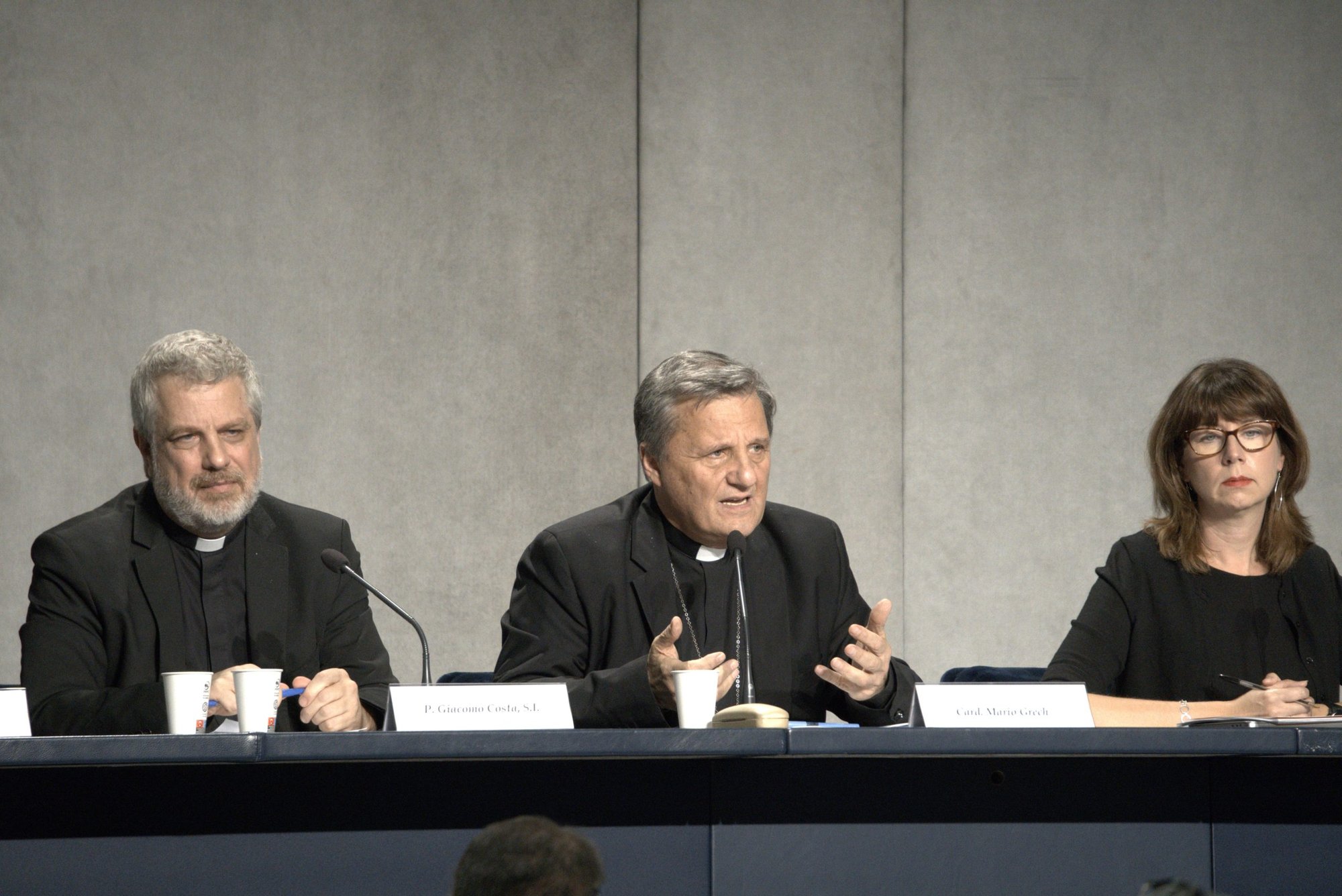 Cardinal Mario Grech, center, secretary-general of the Synod of Bishops, speaks at a news conference at the Vatican Oct. 27 to present the document for the continental phase of the Synod on synodality. Also pictured are Italian Jesuit Father Giacomo Costa, adviser to the secretary-general of the synod, and Anna Rowlands, professor of Catholic social thought and practice at Durham University in the United Kingdom. (CNS photo/Junno Arocho Esteves)