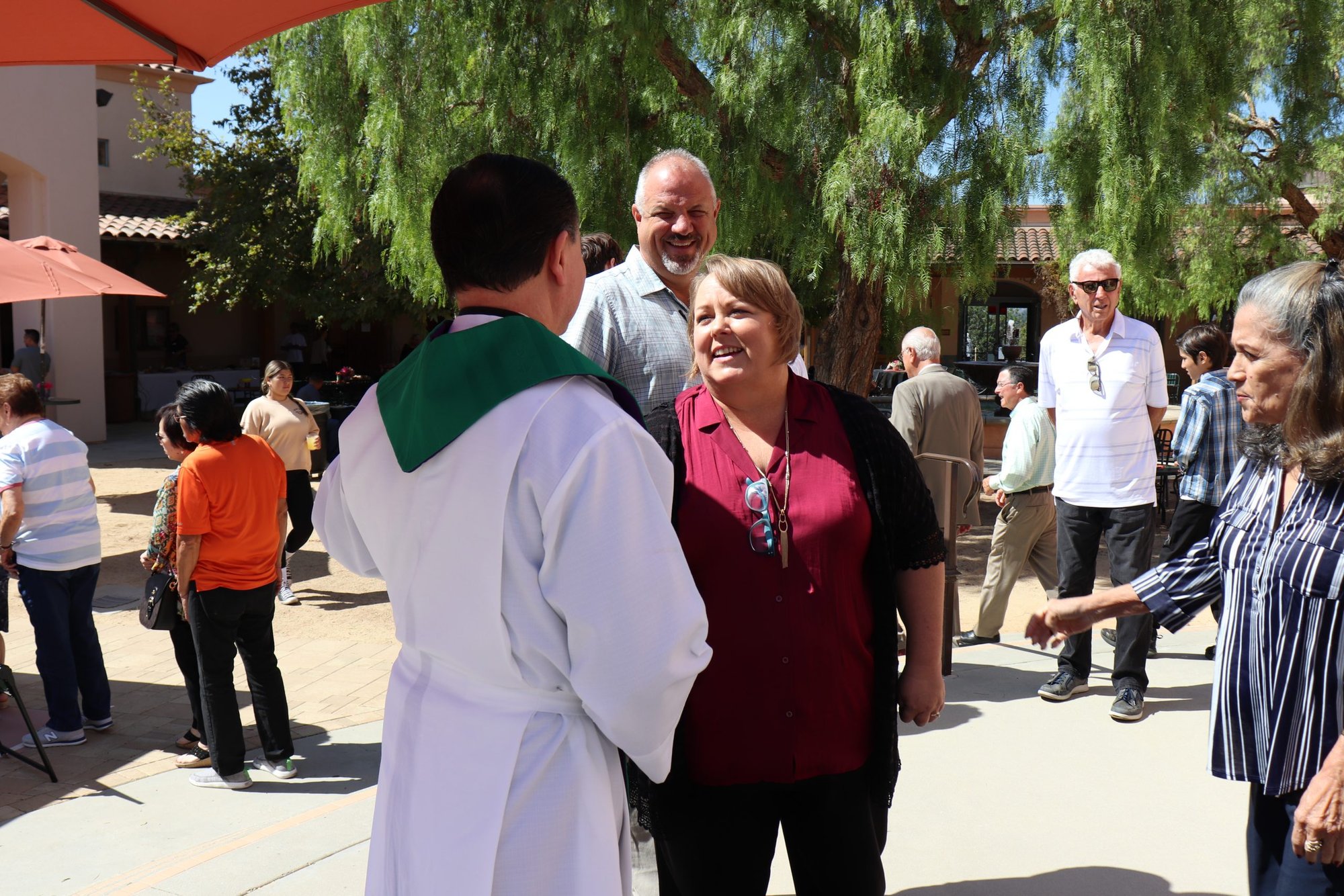 Teresa Runyon (center) was commissioned as pastoral associate for Padre Serra Parish in an Oct. 2 Mass and ceremony. (Courtesy Padre Serra Parish)