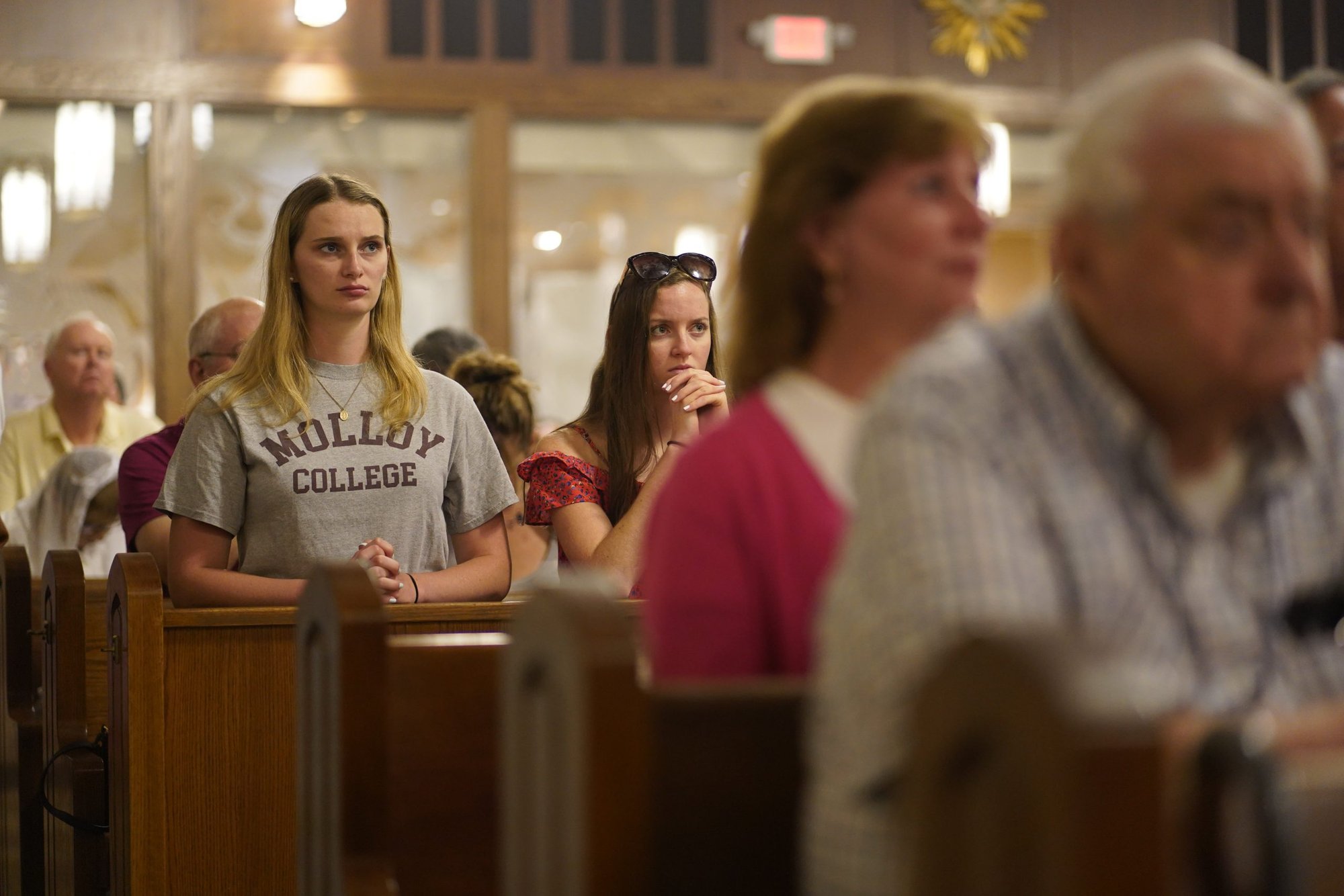Congregants pray during a Mass at Curé of Ars Church in Merrick, New York, Aug. 4. (CNS photo/Gregory A. Shemitz)
