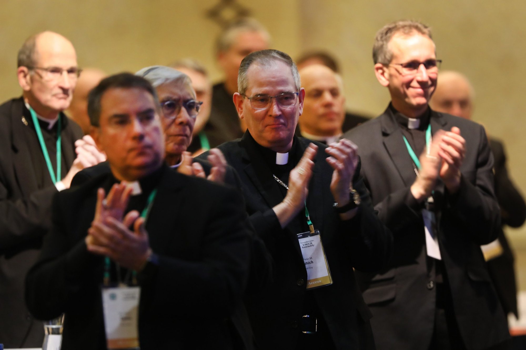 Bishops applaud after Archbishop José H. Gomez of Los Angeles, president of the U.S. Conference of Catholic Bishops, gave his final presidential address during a Nov. 15, 2022, session of the fall general assembly of the bishops' conference in Baltimore. (CNS photo/Bob Roller)