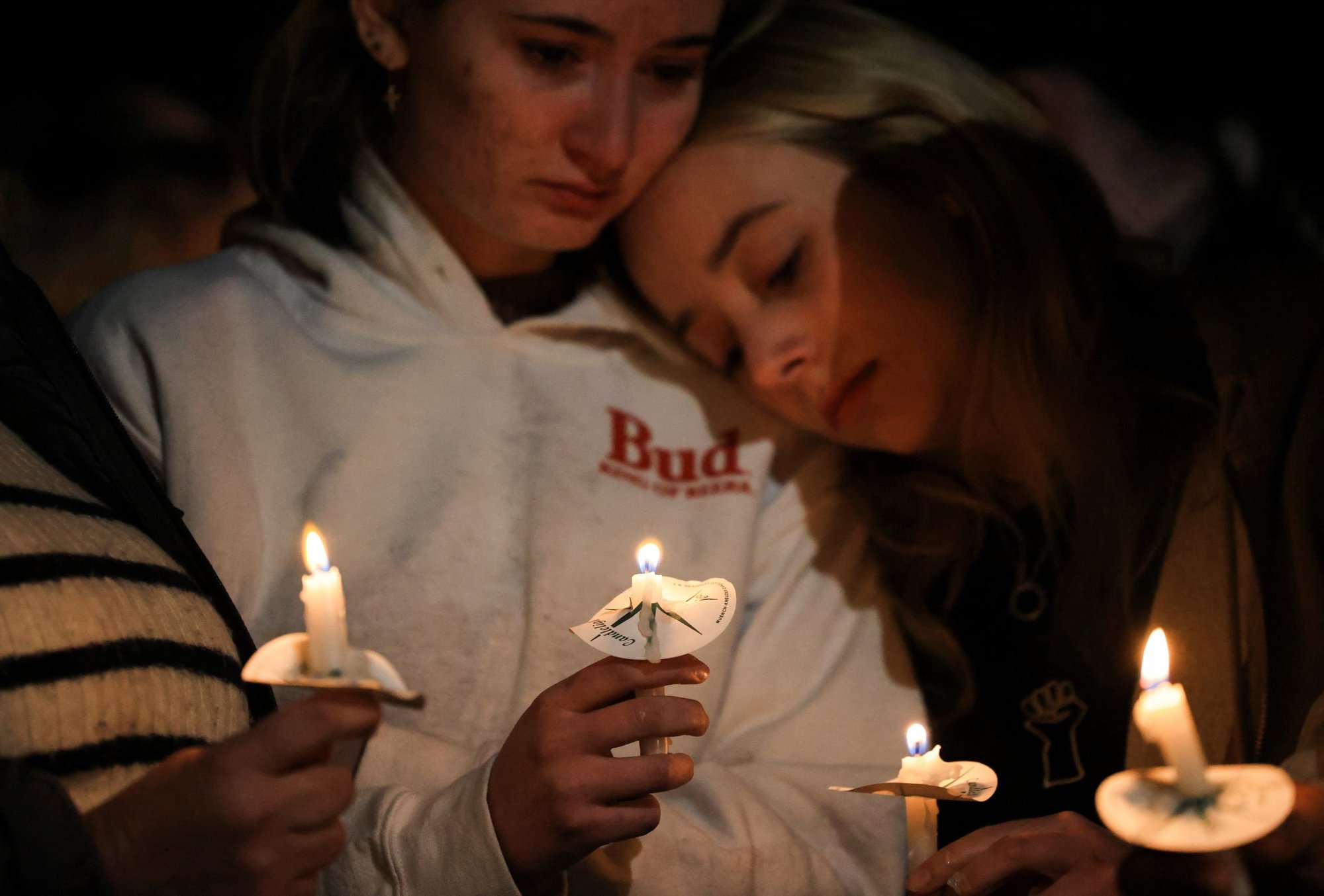 People in Colorado Springs, Colo., attend a vigil Nov. 20, 2022, after a mass shooting at Club Q, a LGBTQ nightclub. At least five people were killed and 25 others injured by a 22-year-old gunman who entered the nightclub just before midnight Nov. 19 and immediately opened fire. The shooting lasted just minutes before patrons confronted and stopped the suspected shooter, identified as 22-year-old Anderson Lee Aldrich. (CNS photo/Kevin Mohatt, Reuters)