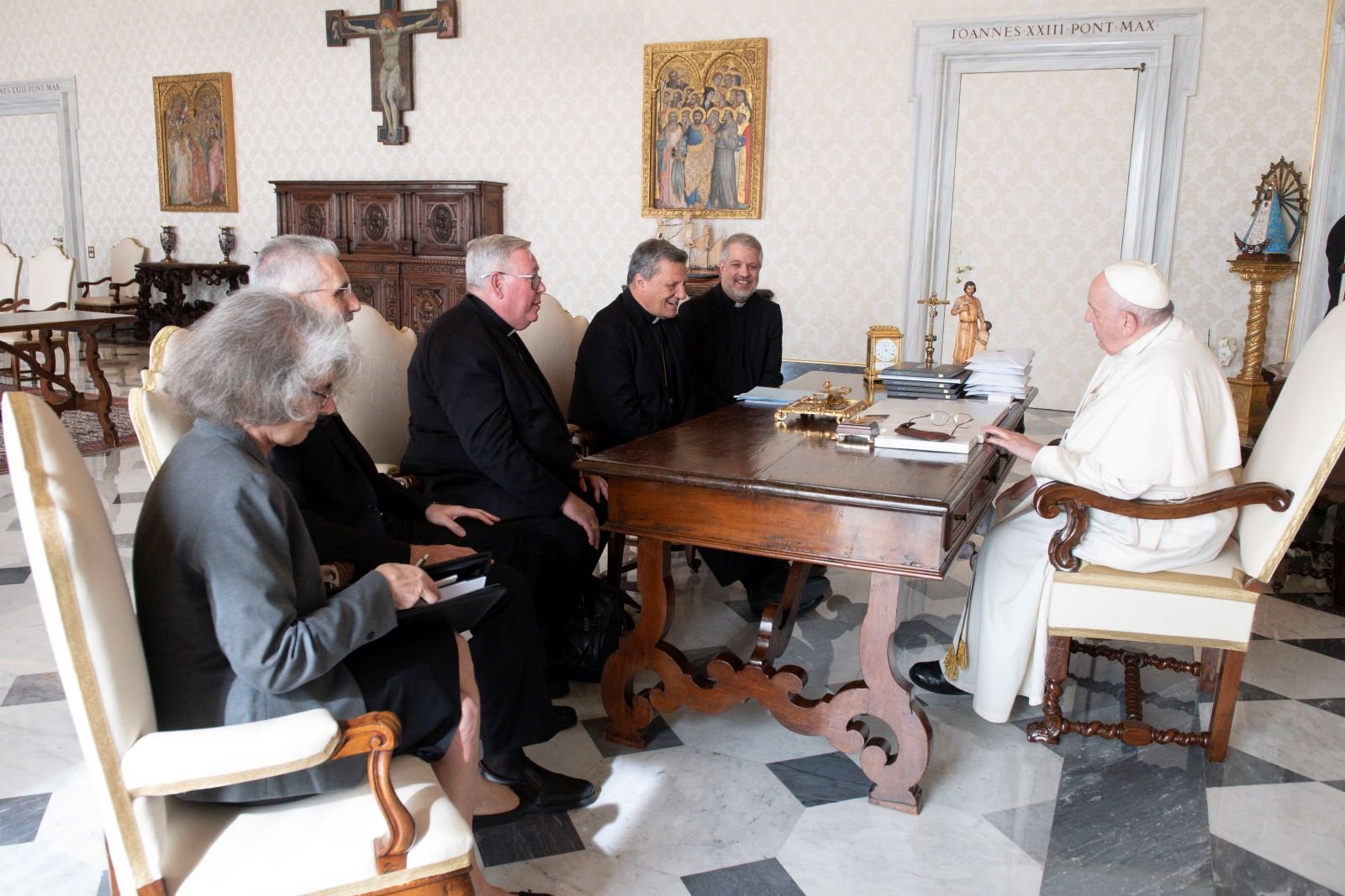 Pope Francis meets with leaders of the Synod of Bishops' general secretariat in the library of the Apostolic Palace at the Vatican Oct. 14. Two days later, the pope announced there would be sessions of the Synod of Bishops in 2023 and 2024. (CNS/Vatican Media)