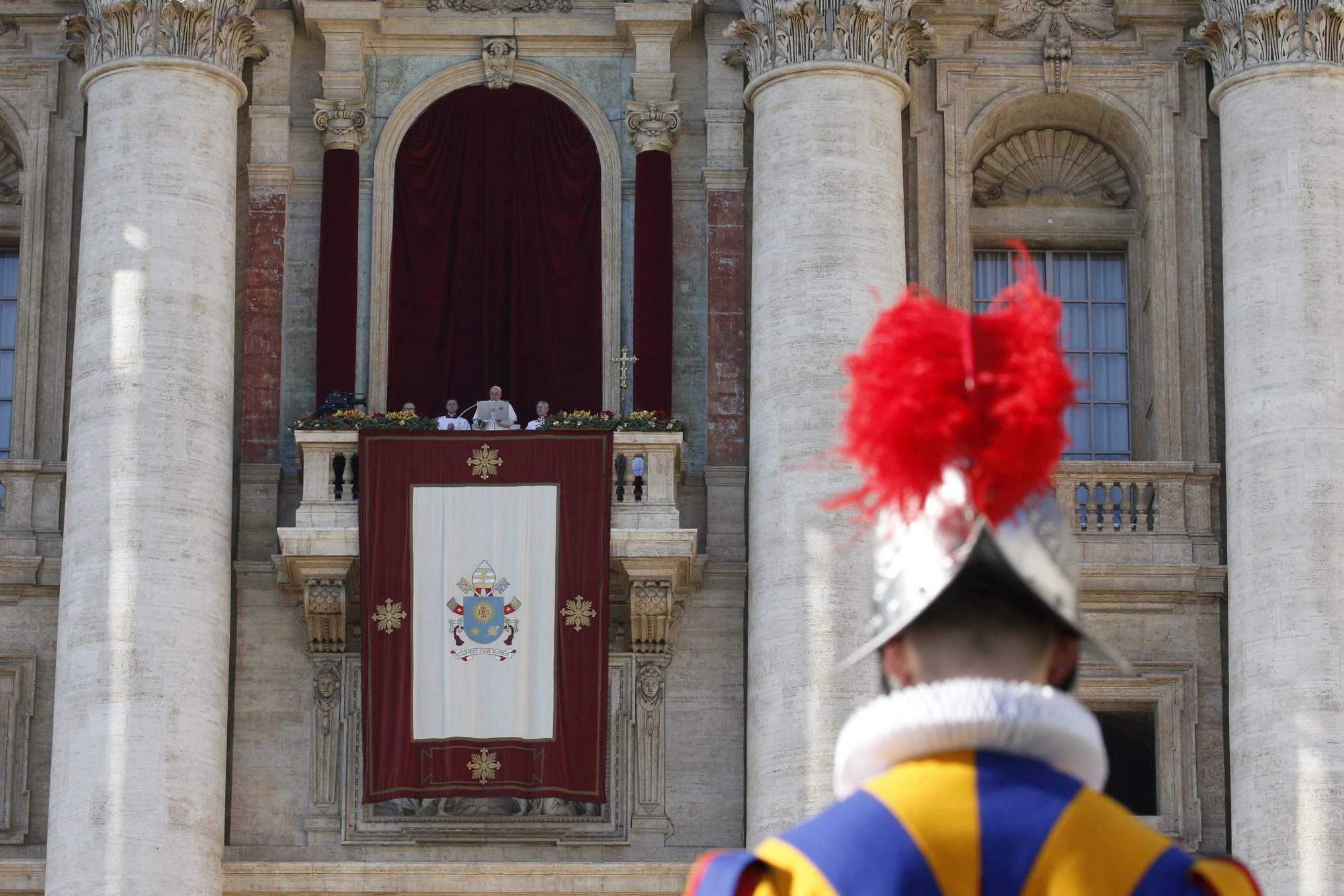 Pope Francis speaks as he leads his Christmas message and his blessing "urbi et orbi" (to the city and the world) from the central balcony of St. Peter's Basilica at the Vatican Dec. 25, 2022. (CNS photo/Paul Haring)