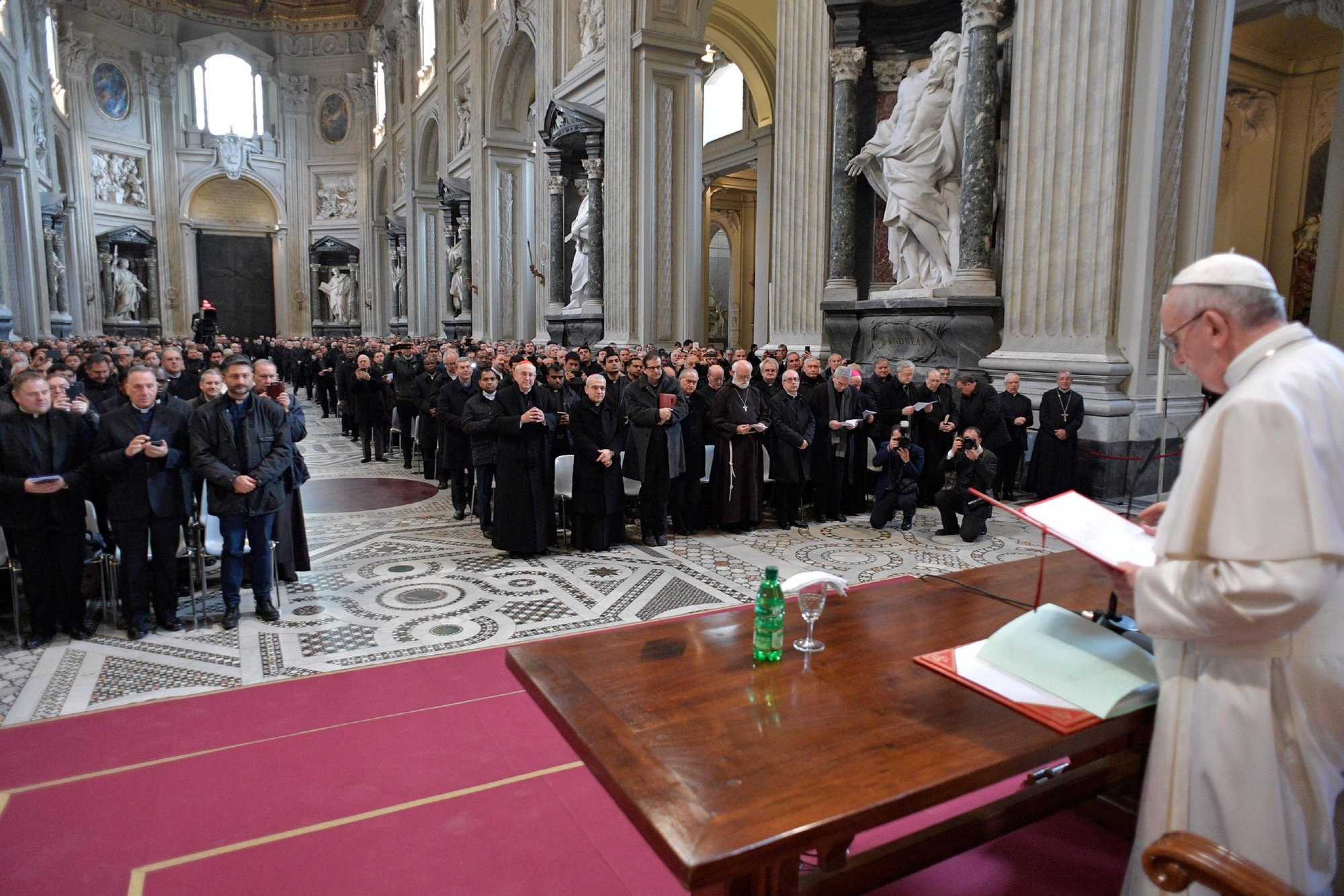 Pope Francis addresses priests of the Diocese of Rome during a meeting at the Basilica of St. John Lateran in Rome in this March 2, 2017, file photo. The pope has reorganized the vicariate of Rome establishing two new bodies: an office dedicated to safeguarding minors and vulnerable people; and an independent supervisory commission of papally-appointed experts who report and check on the work and administrative and economic affairs of the vicariate. (CNS photo/L'Osservatore Romano, handout)
