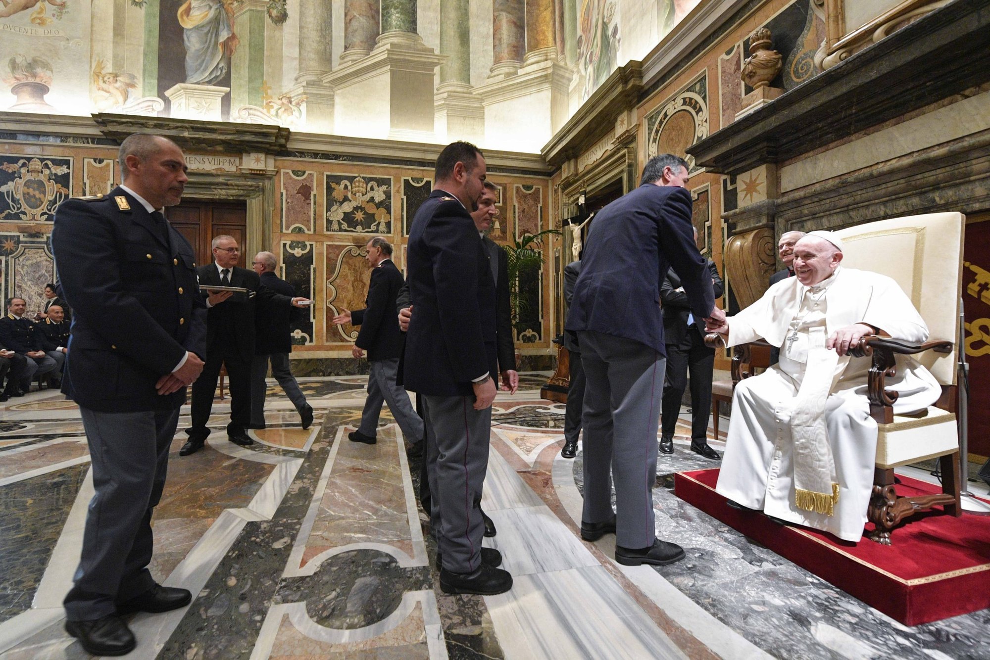 Pope Francis greets members of the Inspectorate for Public Security at the Vatican, a special branch of the Italian police force, during an audience at the Vatican Jan. 12, 2023. (CNS photo/Vatican Media)