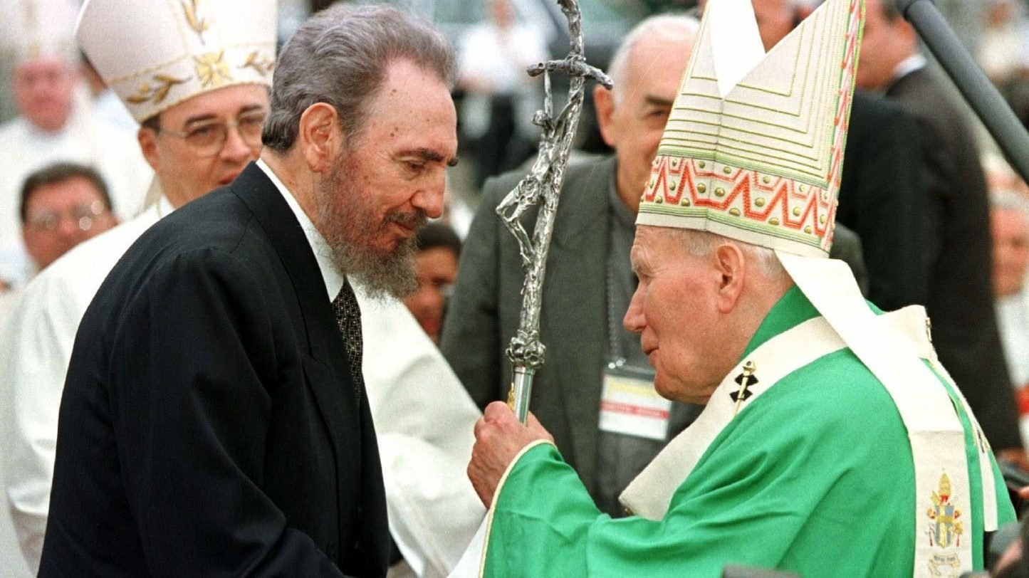Pope John Paul II greets Cuban President Fidel Castro at the end of Mass in the Plaza of the Revolution in Havana in this Jan. 25, 1998, file photo. Pope Francis wrote a letter to Cuban Catholics to mark 25 years since St. John Paul II visited the country. (CNS photo/Reuters)