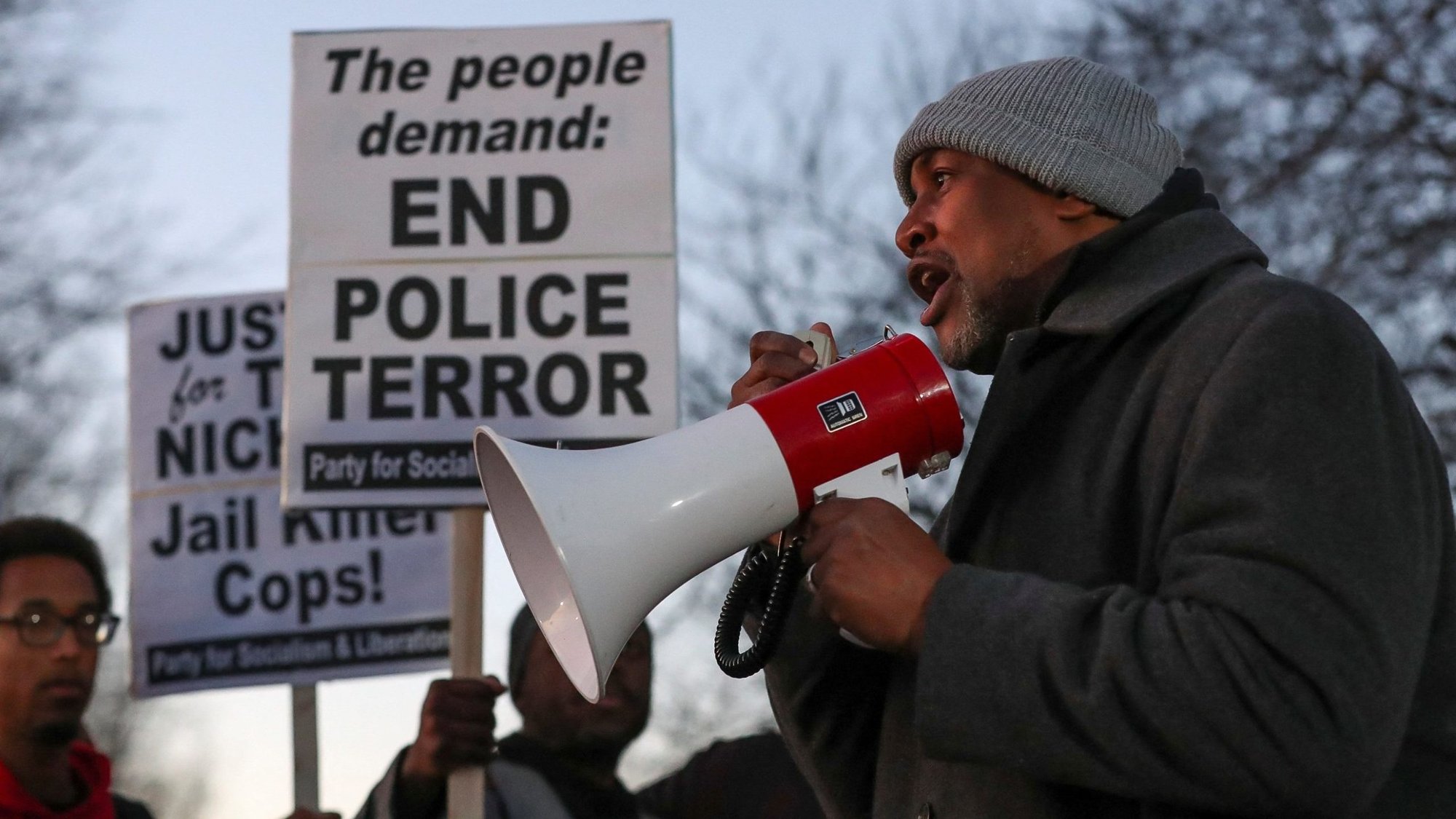 A man speaks through a bullhorn during a protest in Memphis, Tenn., Jan. 27, 2023, on the day of the release of the video showing police officers beating Tyre Nichols, the young Black man who was killed as a result of a traffic stop by Memphis police officers. (OSV News photo/Alyssa Pointer, Reuters)