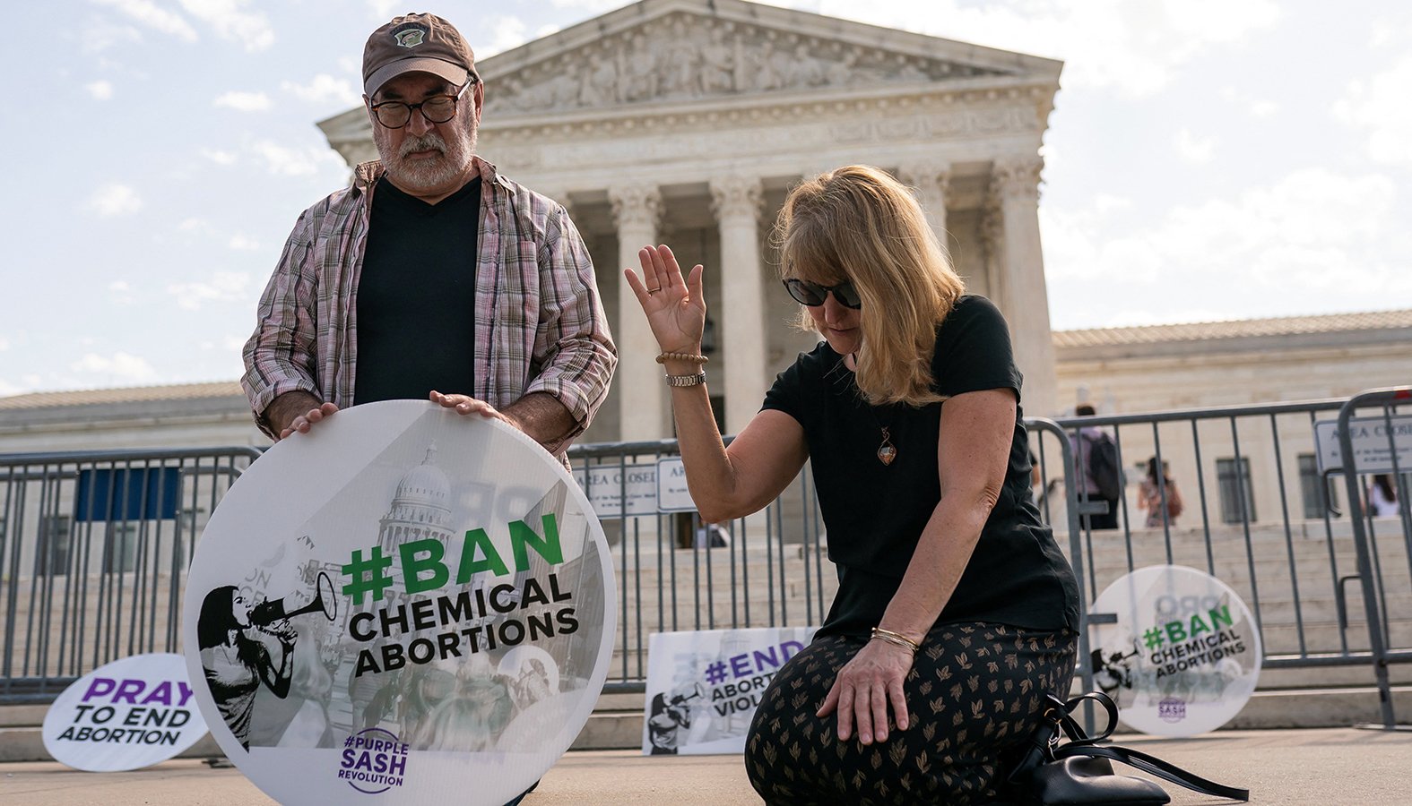 Pro-life activists hold a prayer vigil and news conference to call for the U.S. Supreme Court justices to "affirm the decision of Federal District Court Judge Matthew Kacsmaryk who suspended the Food and Drug Administration's approval of Mifepristone," in front of the Supreme Court in Washington April 21. (OSV News photo/Nathan Howard, Reuters)