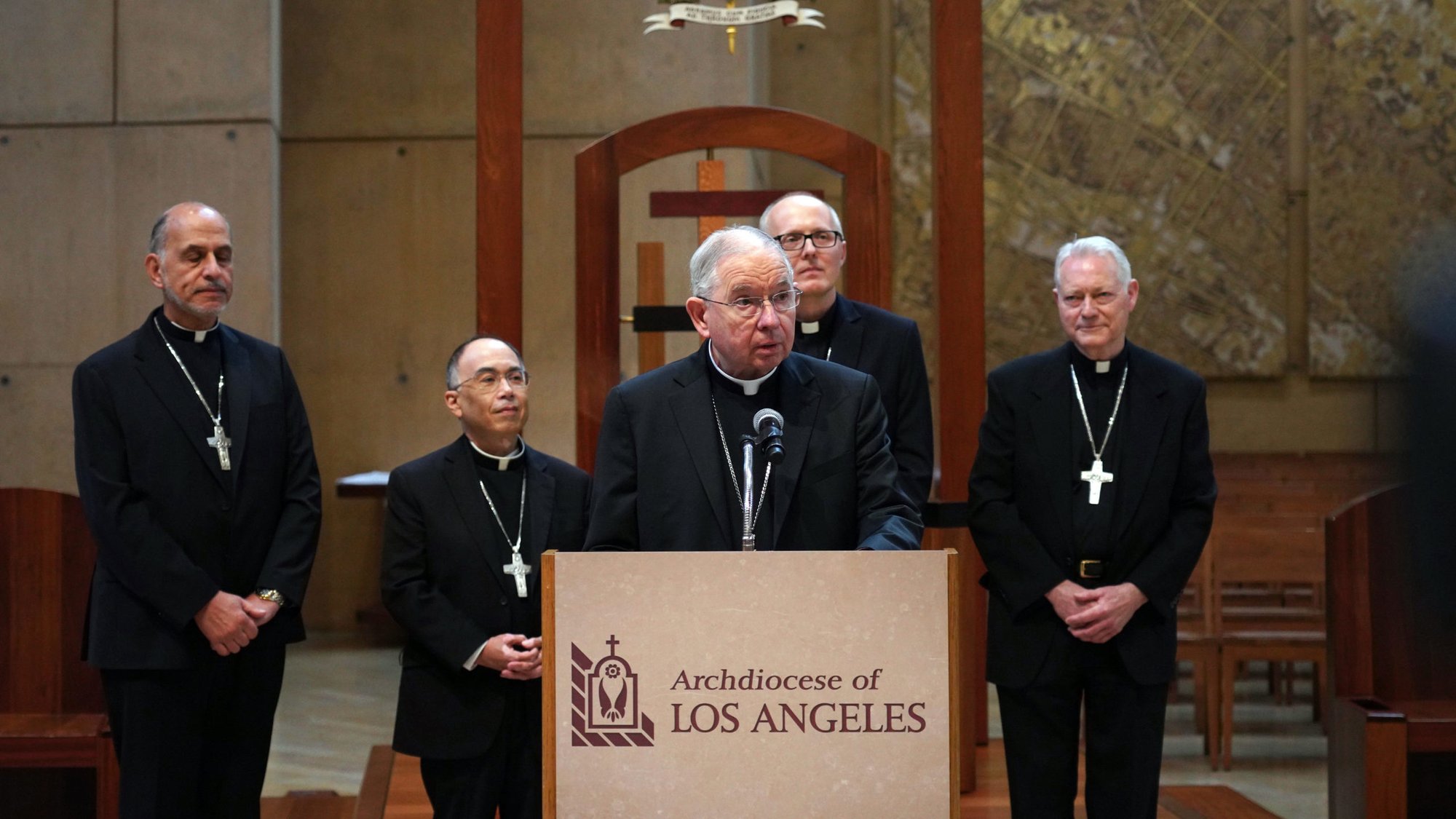 Los Angeles Archbishop José H. Gomez, center, introduces new LA auxiliary bishops appointed by Pope Francis (left to right): Msgr. Albert Bahhuth, Father Brian Nunes, Father Slawomir Szkredka and Father Matthew Elshoff OFM, Cap. (Isabel Cacho/Archdiocese of Los Angeles)