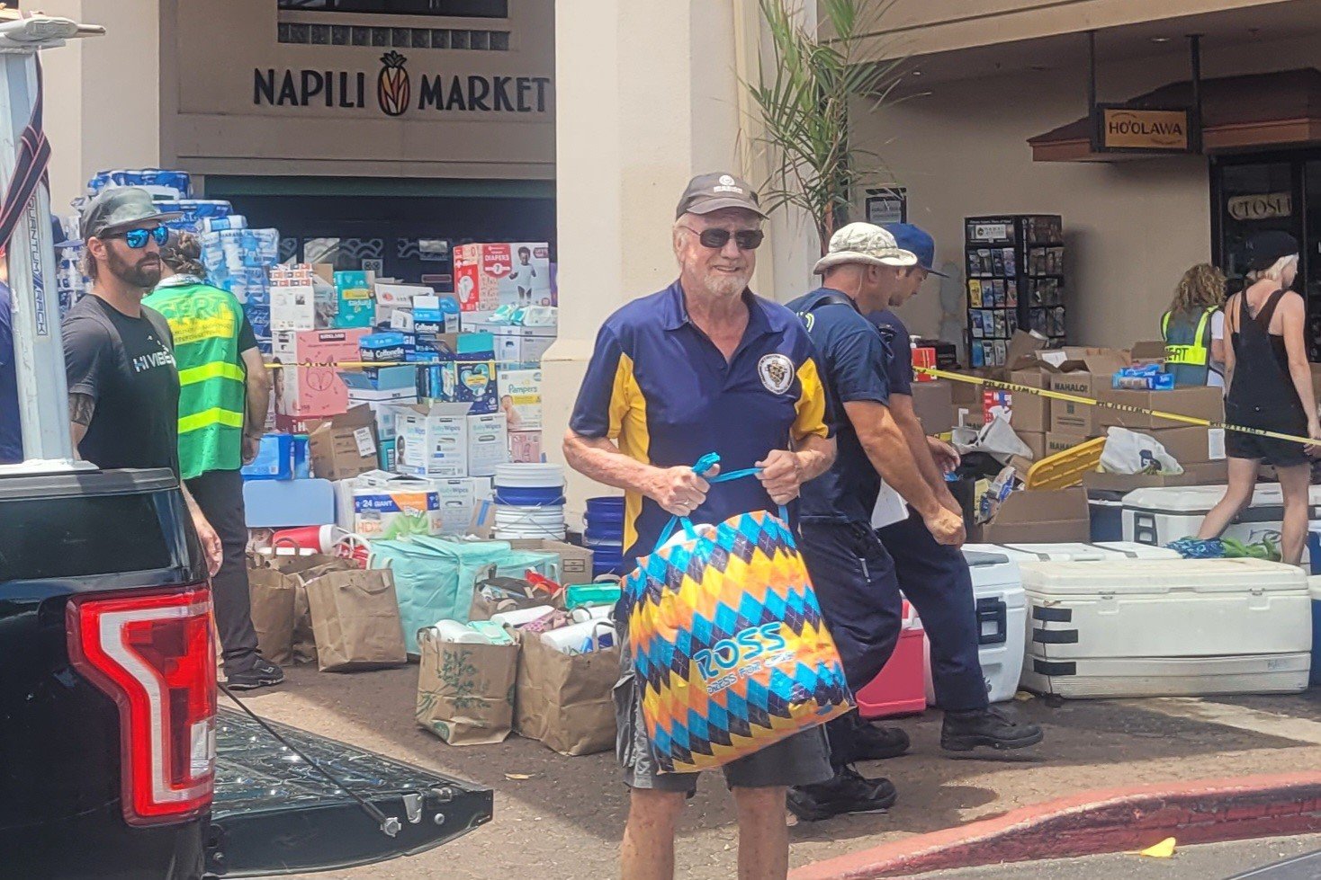 Retired LA priest Father Ken Deasy helps out at an aid distribution center on Maui after the August wildfires. (Submitted photo)