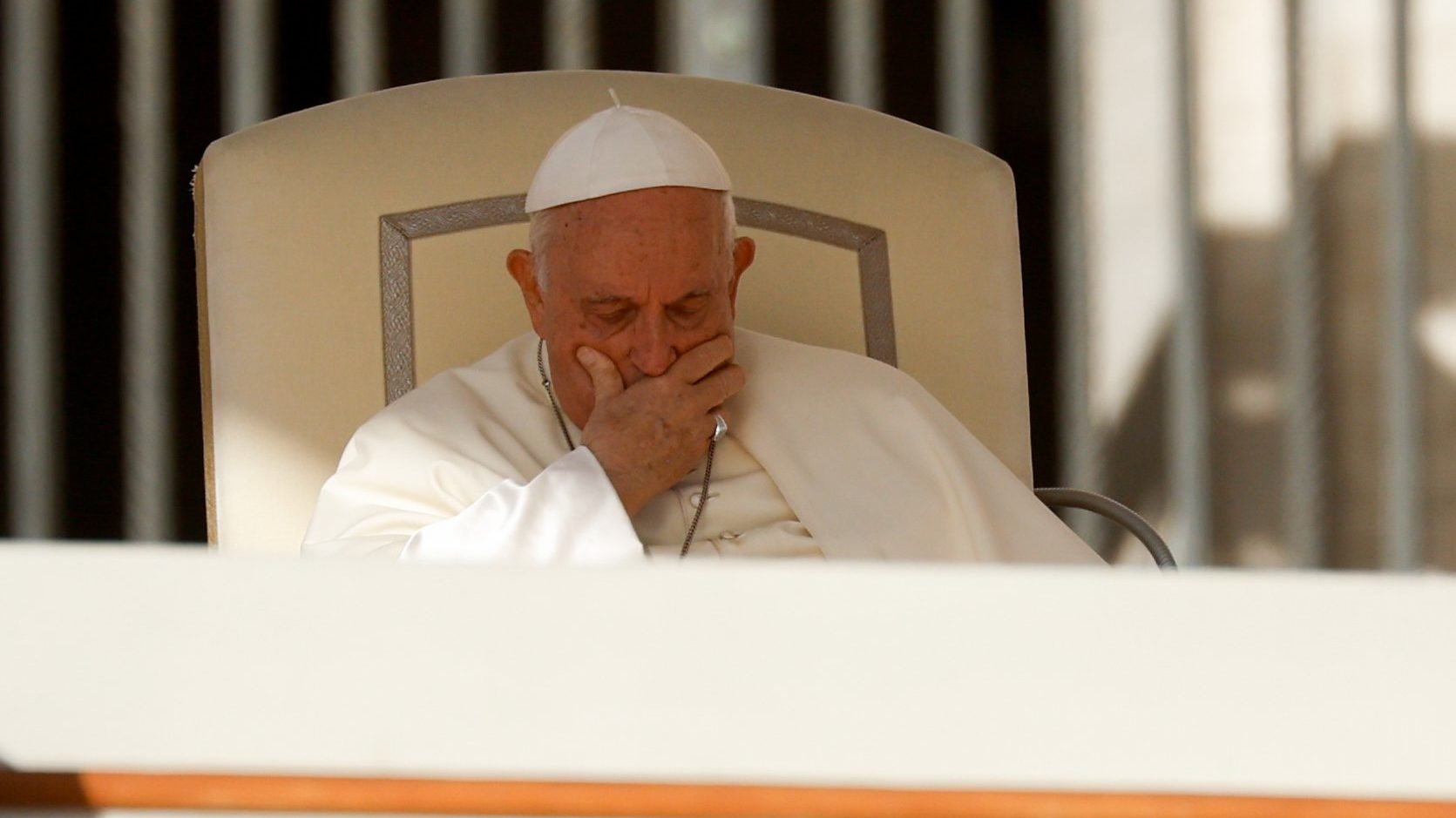 Pope Francis places his hand on his face during his weekly general audience in St. Peter's Square at the Vatican Oct. 11, 2023. (CNS/Lola Gomez)