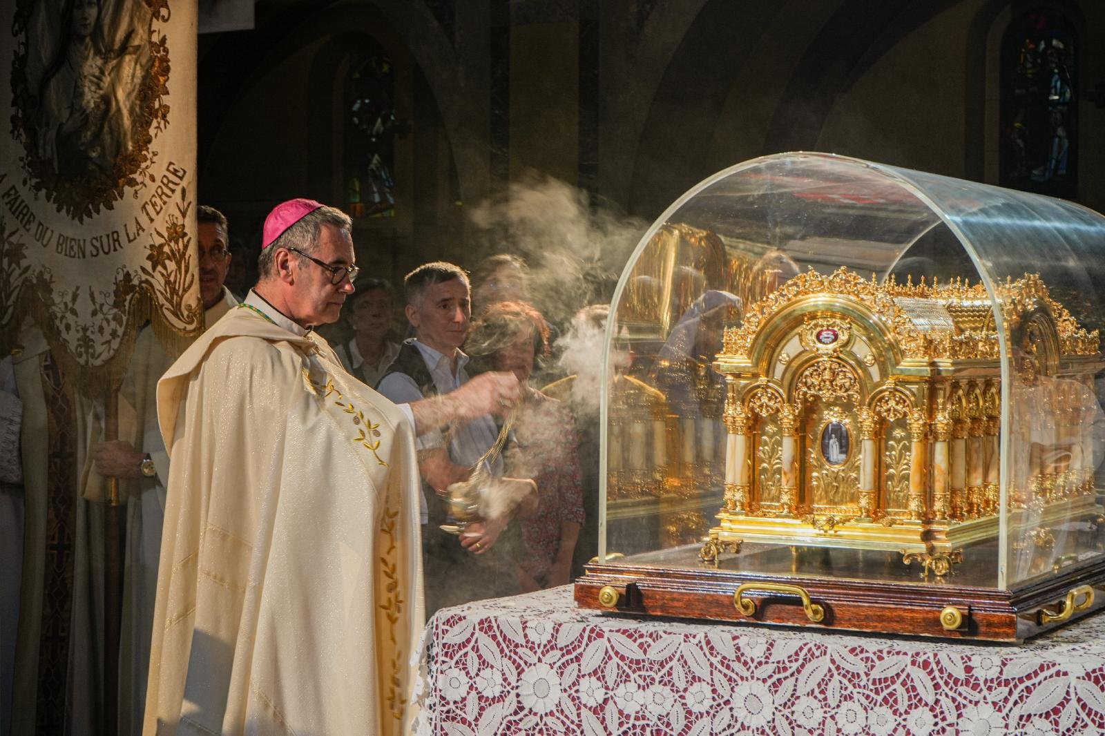 Bishop Jacques Habert of Bayeux-Lisieux, France, censes a reliquary holding relics of the saint in the Basilica of St. Thérèse in Lisieux, where 9,000 people attended a ceremony Oct. 1, 2023, the feast of one of the Catholic Church's favorite saints. The ceremony officially opened the so-called Theresian celebrations held Sept. 30-Oct. 8. (OSV News/courtesy Sanctuary of St. Thérèse of Lisieux)